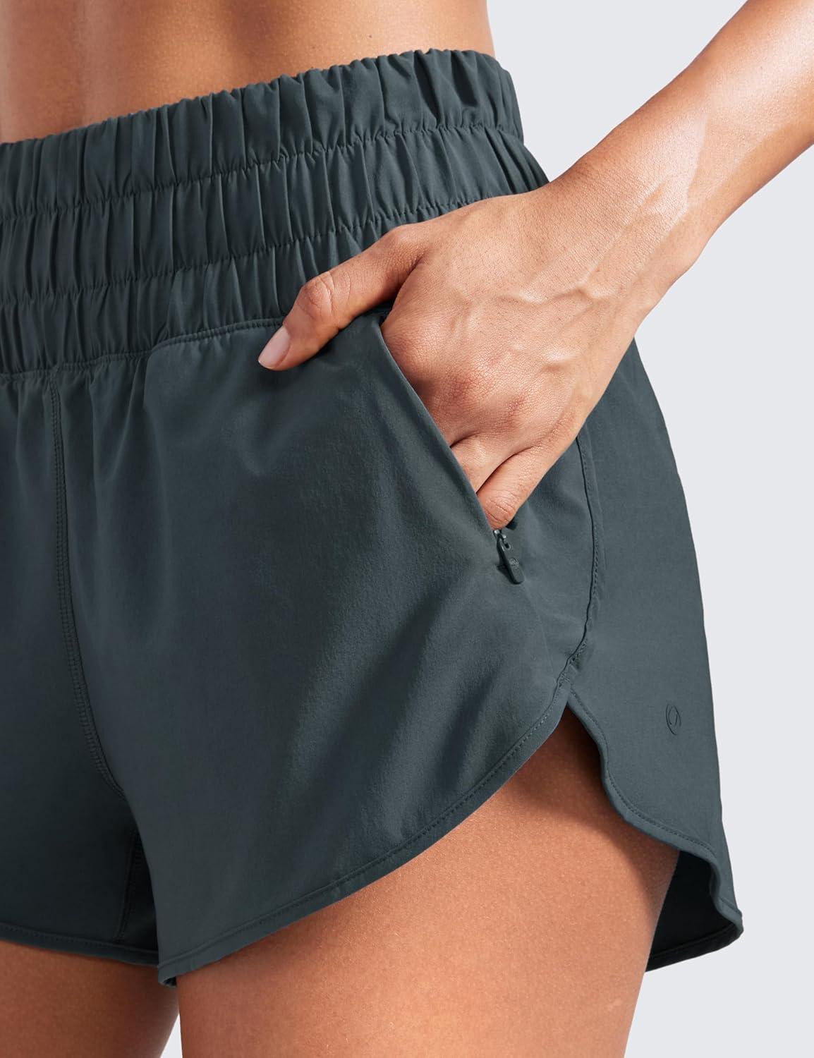 imageCRZ YOGA High Waisted Dolphin Running Shorts for Womens Mesh Liner for Gym Workout Athletic with Zipper PocketMelanite