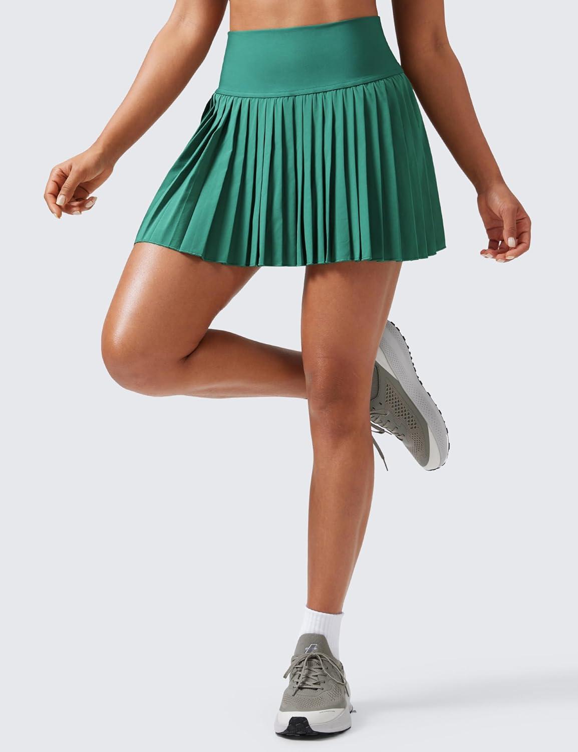 imageCRZ YOGA High Waisted Pleated Tennis Skirts for Women Mini Lined Casual Tummy Control Skort with PocketsCascadia Green