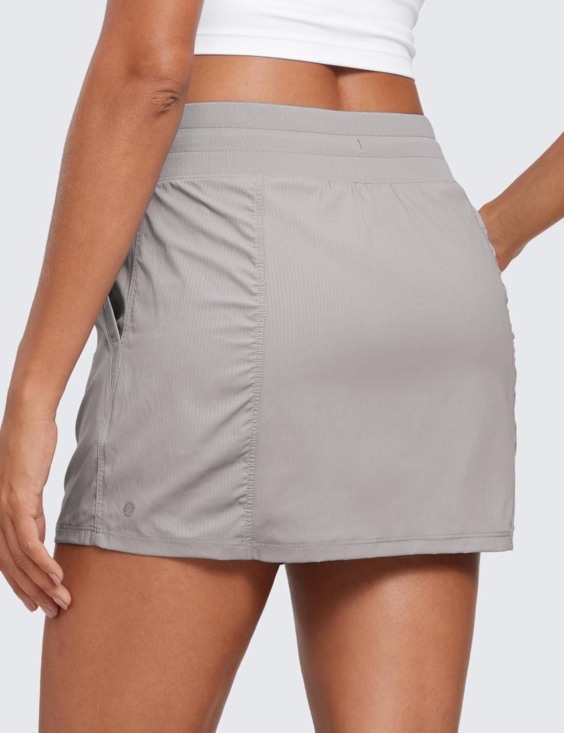 imageCRZ YOGA Lightweight Ruched Casual Skirts for Women High Waisted Mini A Line Golf Drawstring Skort with PocketsDark Chrome