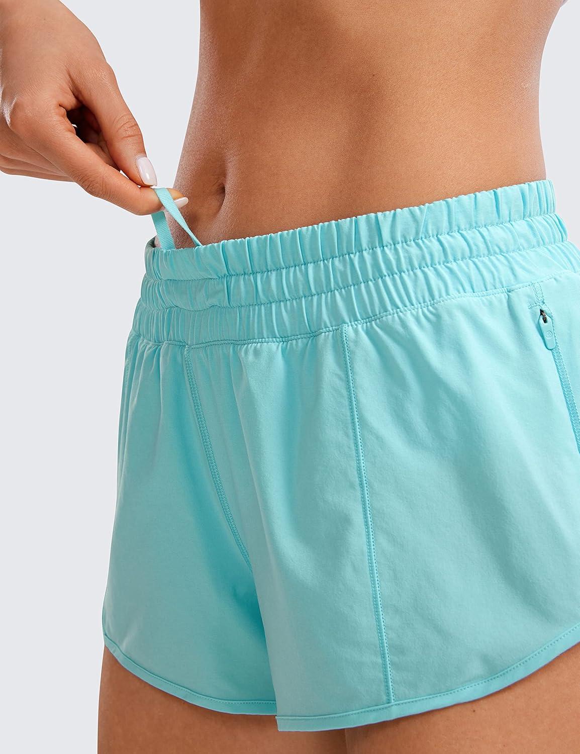 imageCRZ YOGA Low Waisted Running Shorts for Women 25quot Mesh Liner Quick Dry for Workout Sport Athletic with Zipper PocketTurquoise