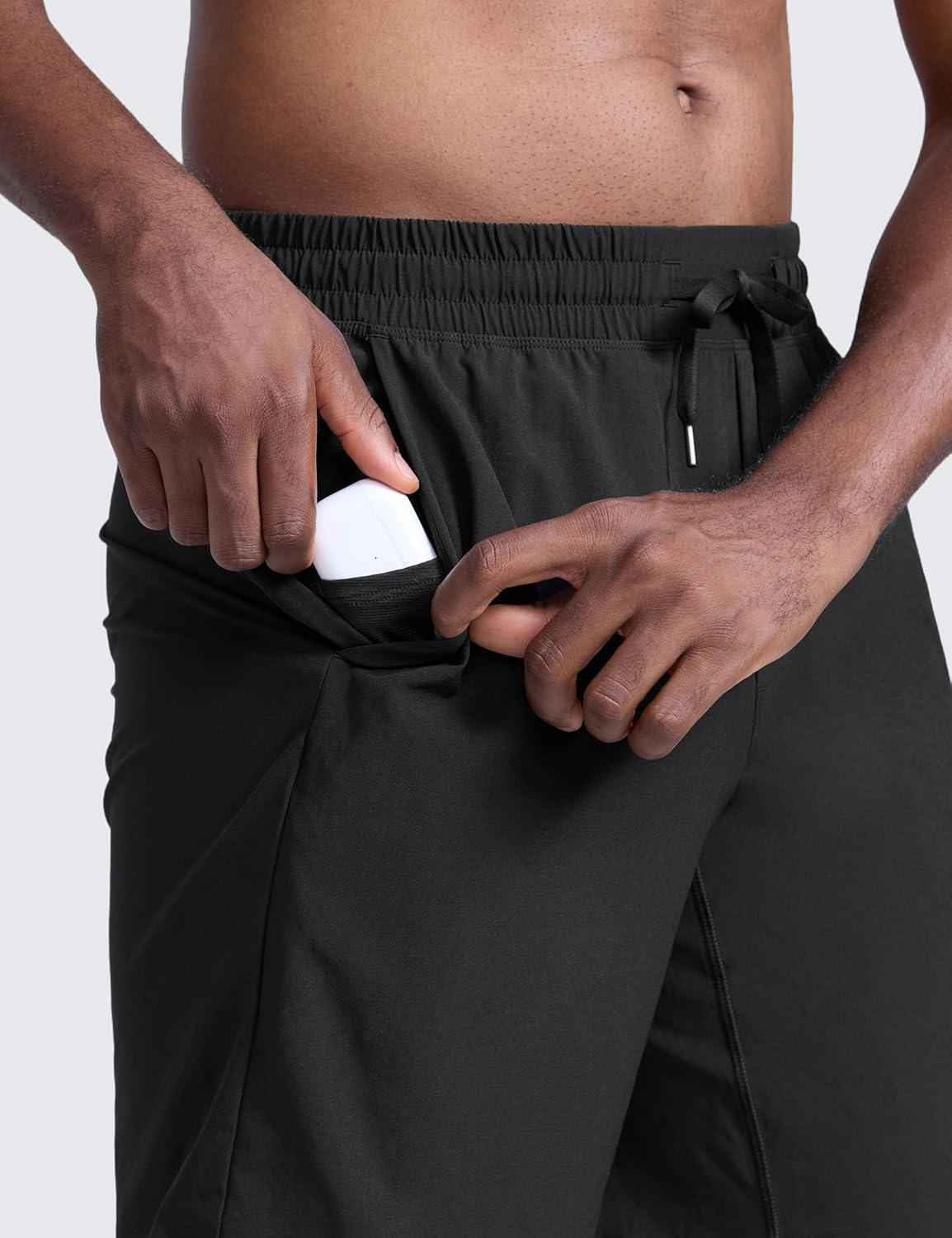 imageCRZ YOGA Mens Linerless Workout Shorts 9 Quick Dry for Running Sports Athletic Gym with PocketsBlack