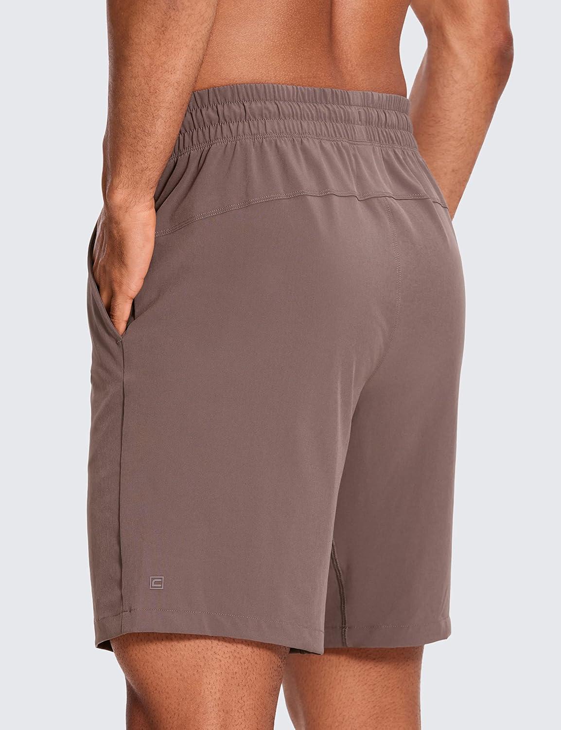 imageCRZ YOGA Mens Linerless Workout Shorts 9 Quick Dry for Running Sports Athletic Gym with PocketsBrown Rock