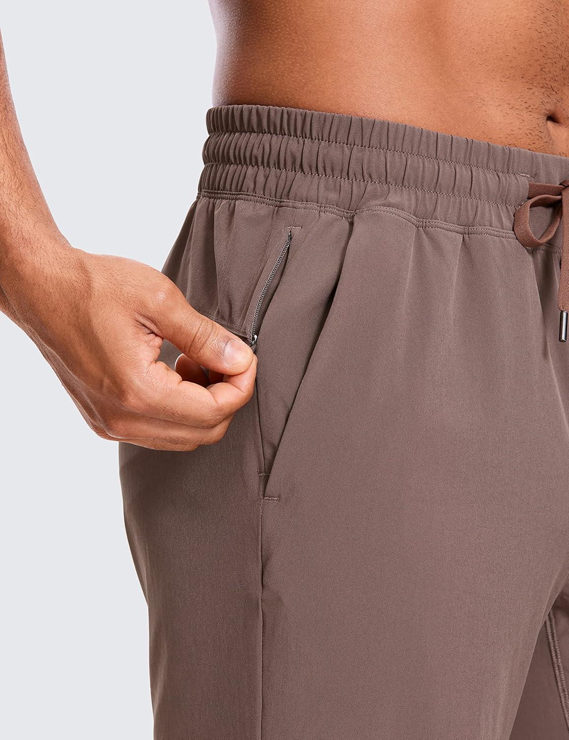 imageCRZ YOGA Mens Linerless Workout Shorts 9 Quick Dry for Running Sports Athletic Gym with PocketsBrown Rock