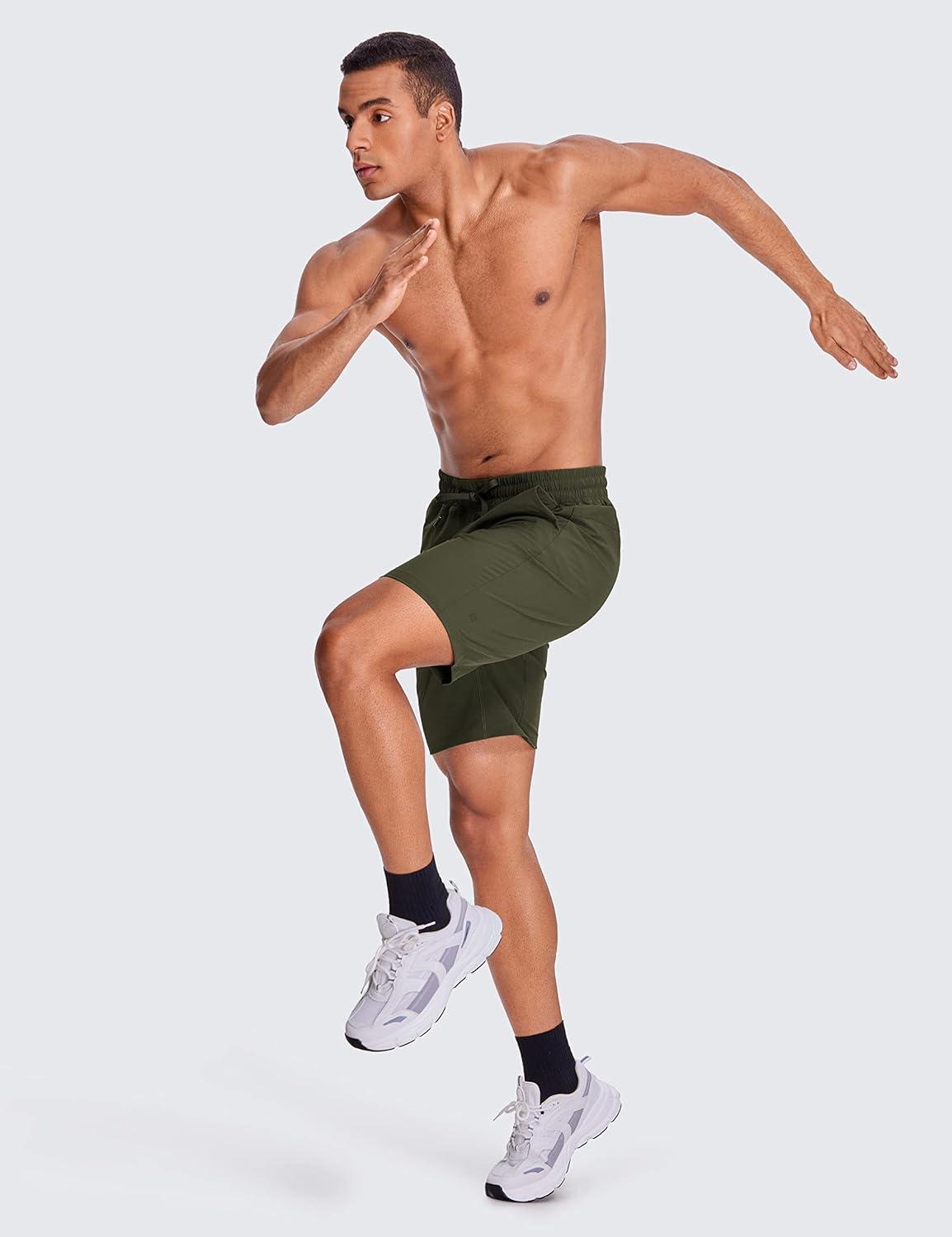imageCRZ YOGA Mens Linerless Workout Shorts 9 Quick Dry for Running Sports Athletic Gym with PocketsDark Olive