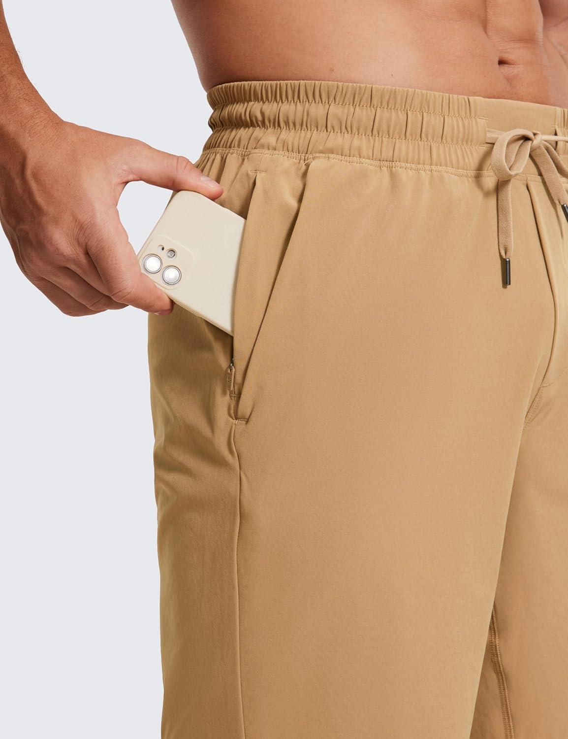 imageCRZ YOGA Mens Linerless Workout Shorts 9 Quick Dry for Running Sports Athletic Gym with PocketsKhaki Sand