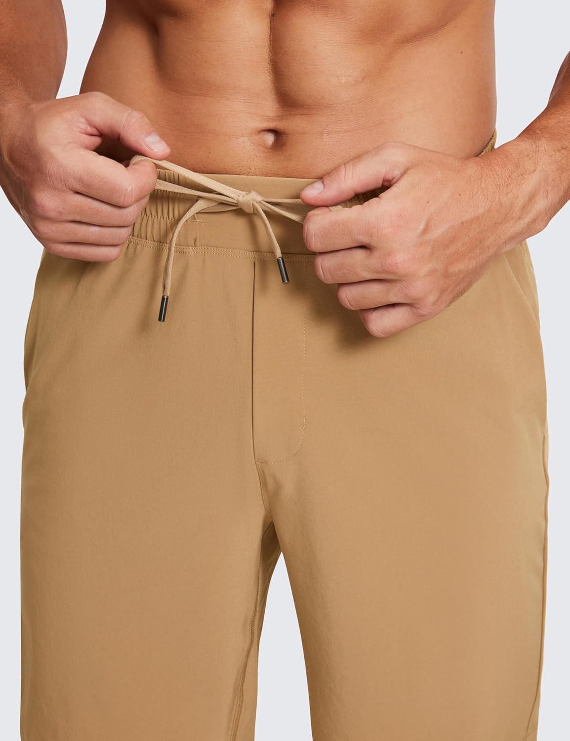 imageCRZ YOGA Mens Linerless Workout Shorts 9 Quick Dry for Running Sports Athletic Gym with PocketsKhaki Sand