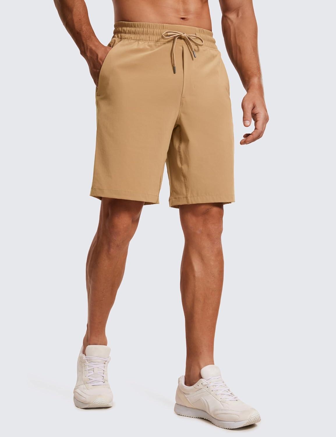 imageCRZ YOGA Mens Linerless Workout Shorts 9 Quick Dry for Running Sports Athletic Gym with PocketsKhaki Sand