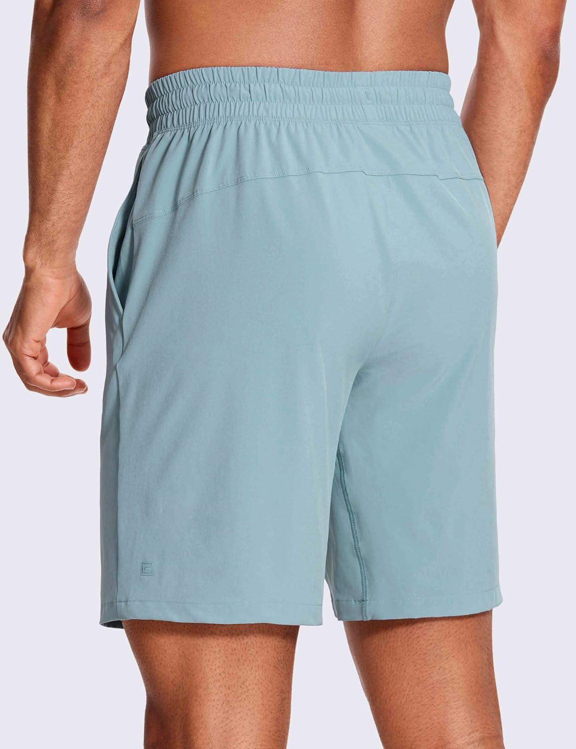 imageCRZ YOGA Mens Linerless Workout Shorts 9 Quick Dry for Running Sports Athletic Gym with PocketsLight Grayish Blue