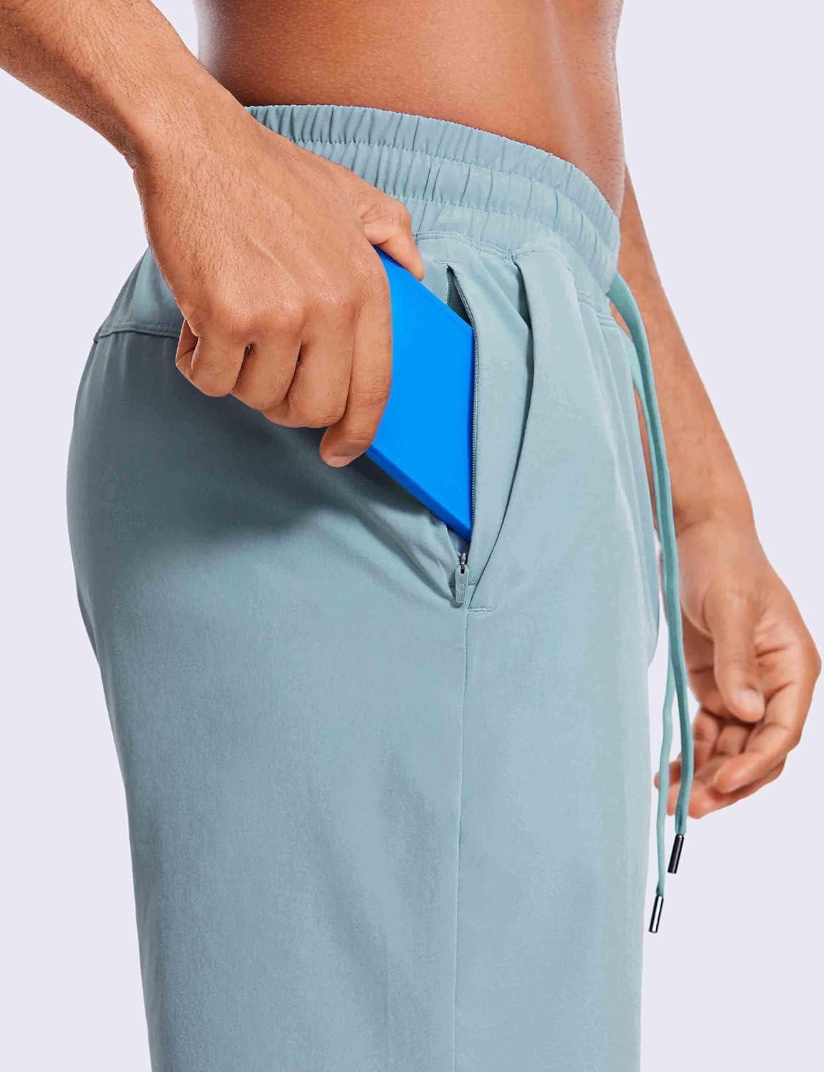 imageCRZ YOGA Mens Linerless Workout Shorts 9 Quick Dry for Running Sports Athletic Gym with PocketsLight Grayish Blue