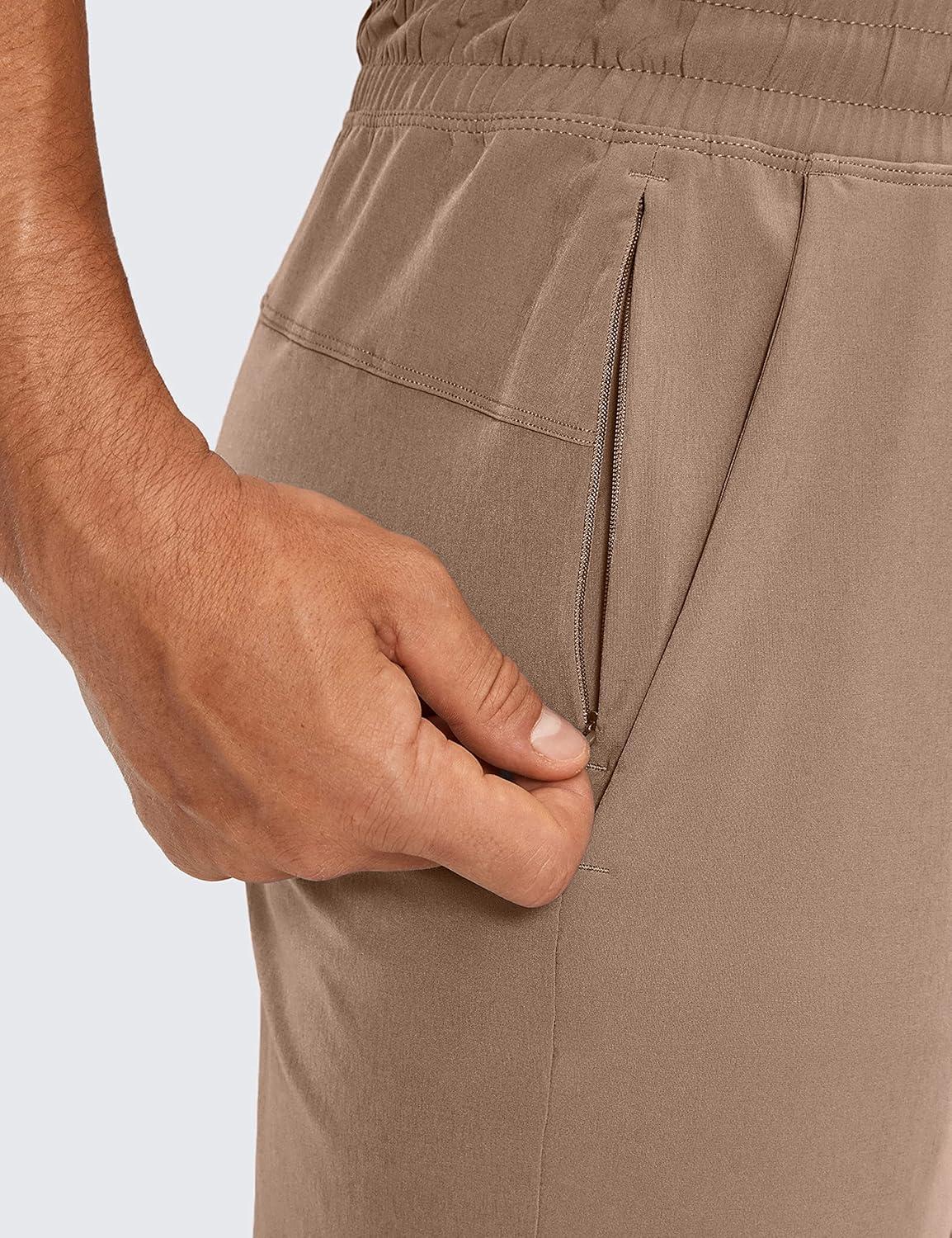 imageCRZ YOGA Mens Linerless Workout Shorts 9 Quick Dry for Running Sports Athletic Gym with PocketsMineral Brown