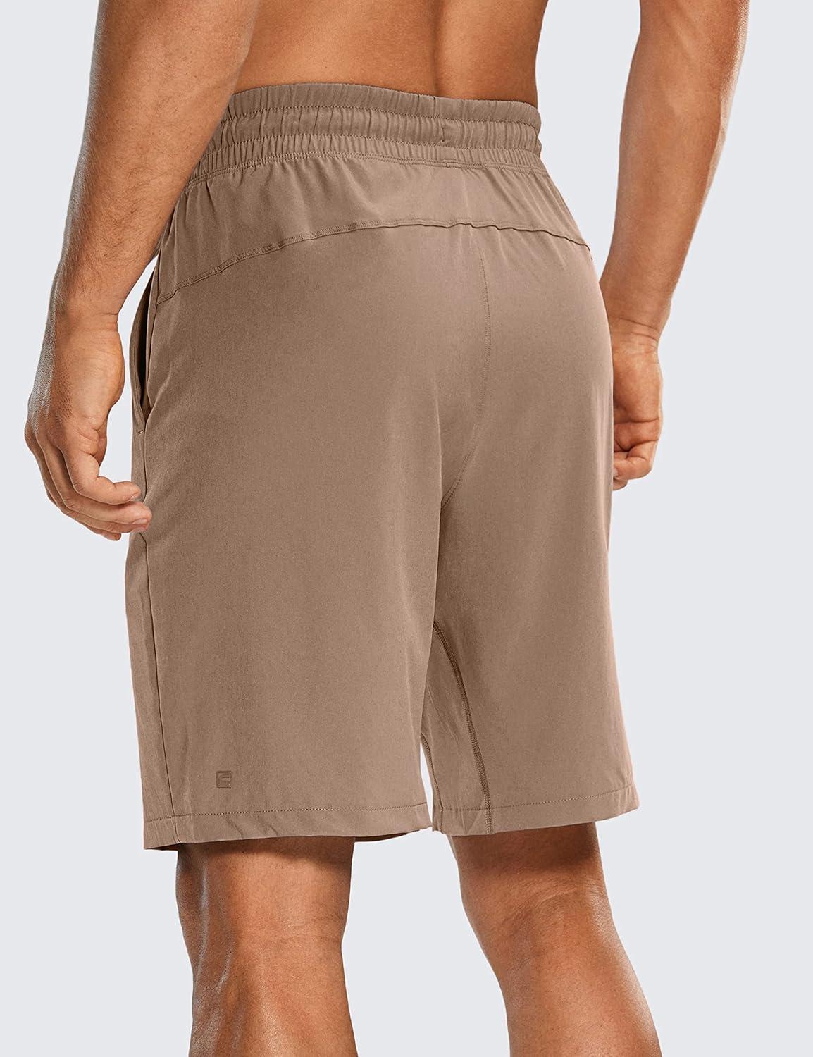 imageCRZ YOGA Mens Linerless Workout Shorts 9 Quick Dry for Running Sports Athletic Gym with PocketsMineral Brown