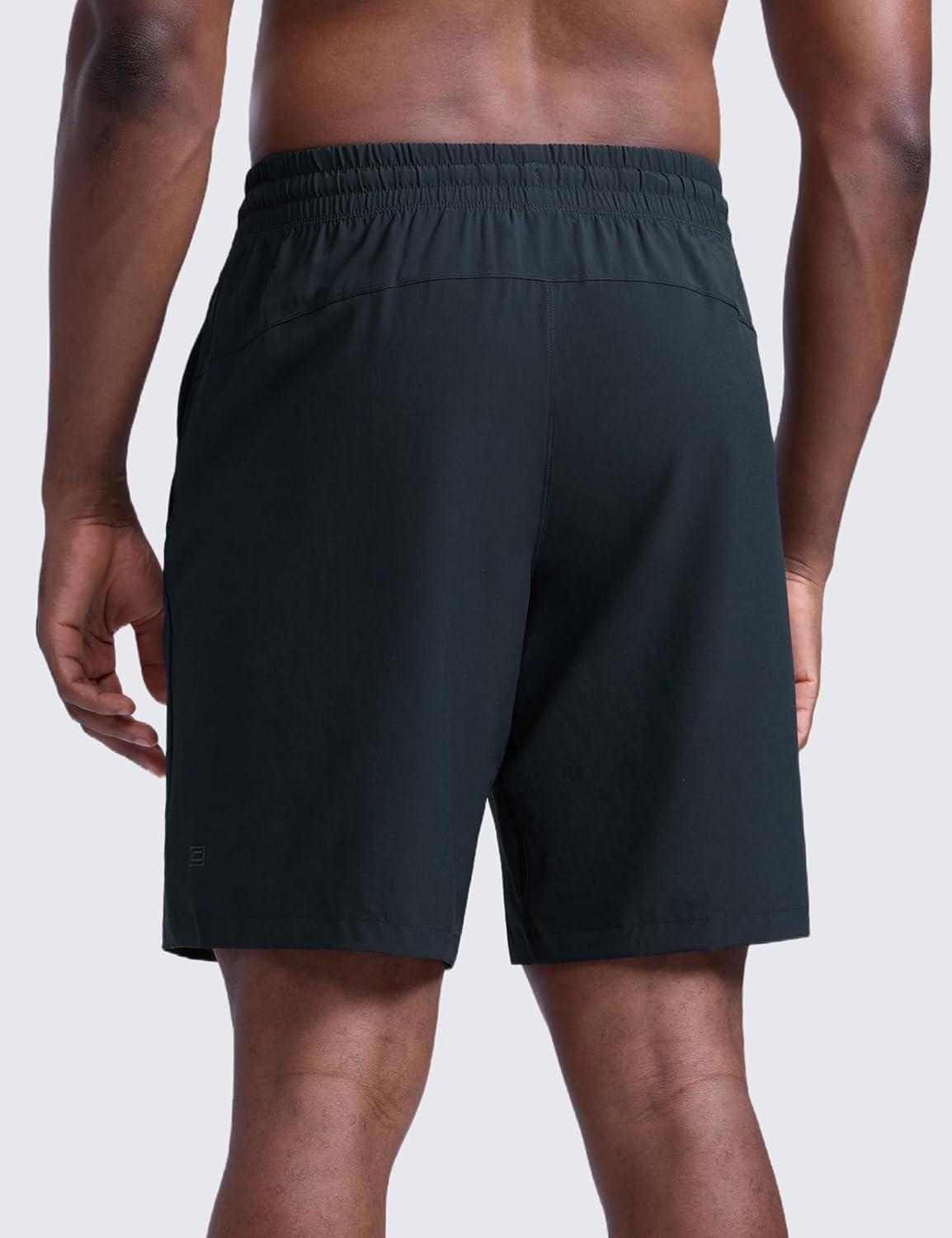 imageCRZ YOGA Mens Linerless Workout Shorts 9 Quick Dry for Running Sports Athletic Gym with PocketsTrue Navy