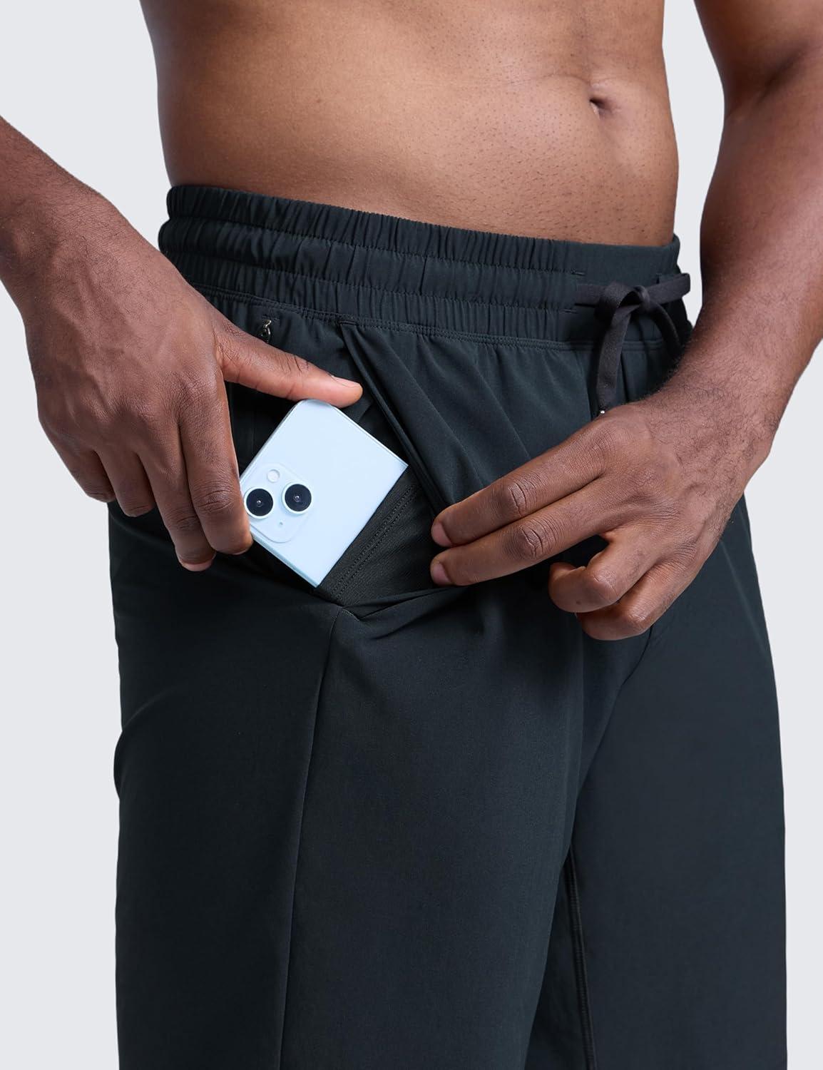 imageCRZ YOGA Mens Linerless Workout Shorts 9 Quick Dry for Running Sports Athletic Gym with PocketsTrue Navy