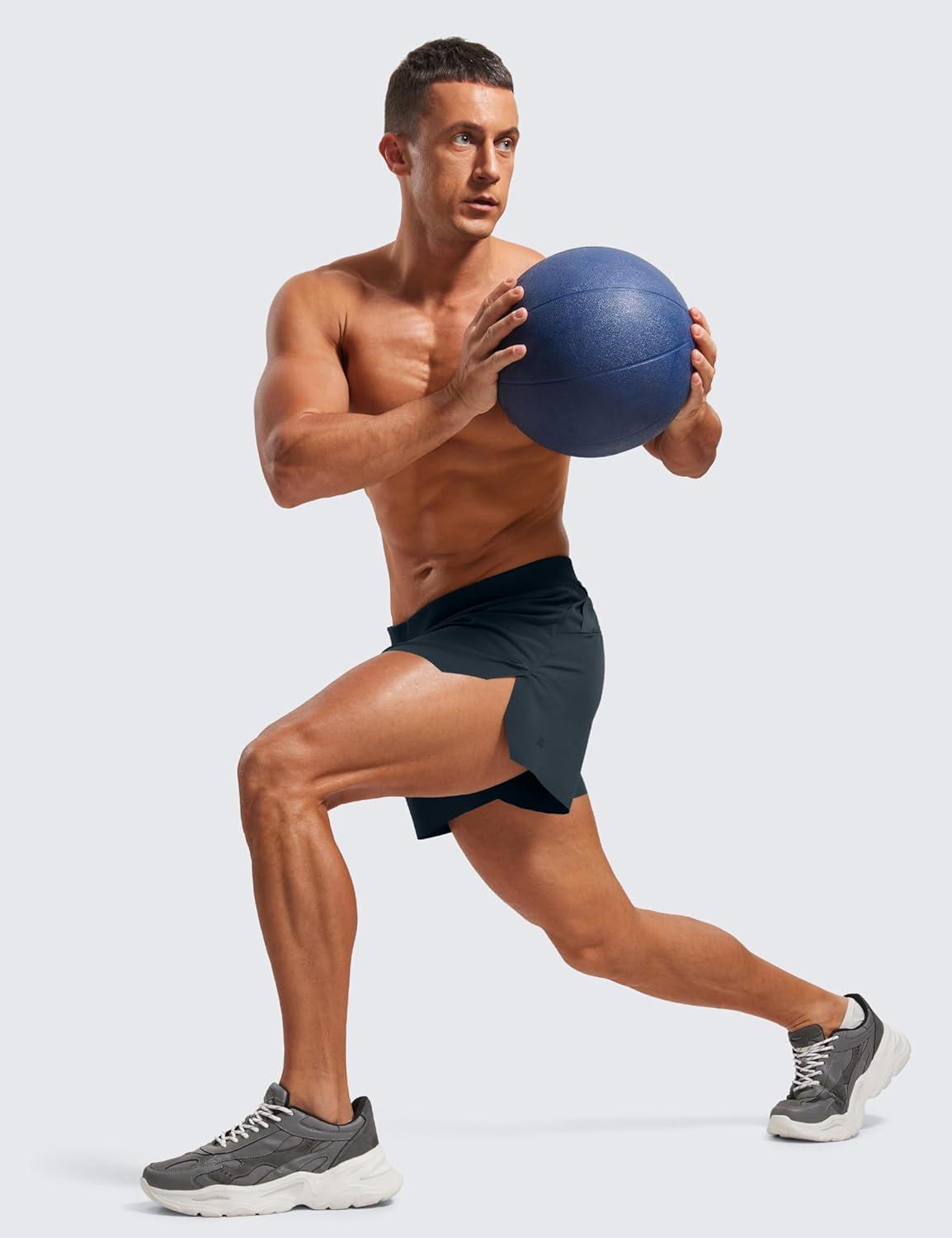 imageCRZ YOGA Mens Side Split Running Shorts 4 Quick Dry for Athletic Gym Workout with Zip Pocket and Brief LinerTrue Navy