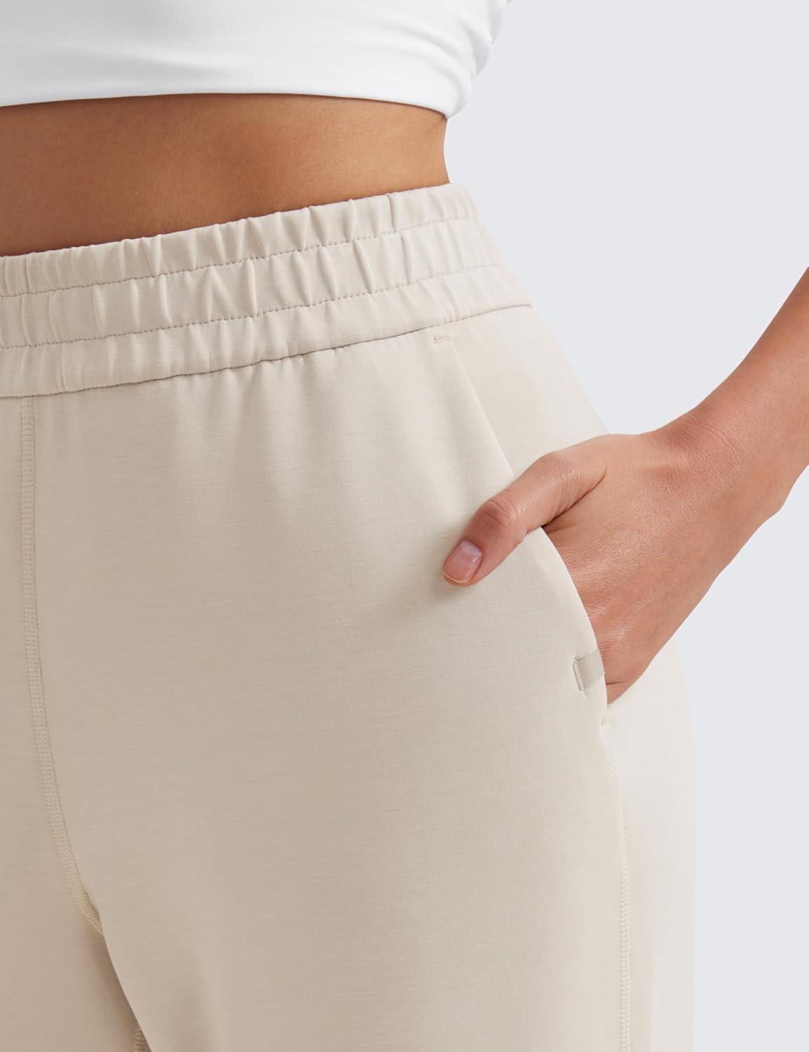 imageCRZ YOGA SoftAura Sweatpants Women Modal Joggers High Waisted Lounge Travel Casual Sweat Pants with Pockets Cinch BottomMojave Tan
