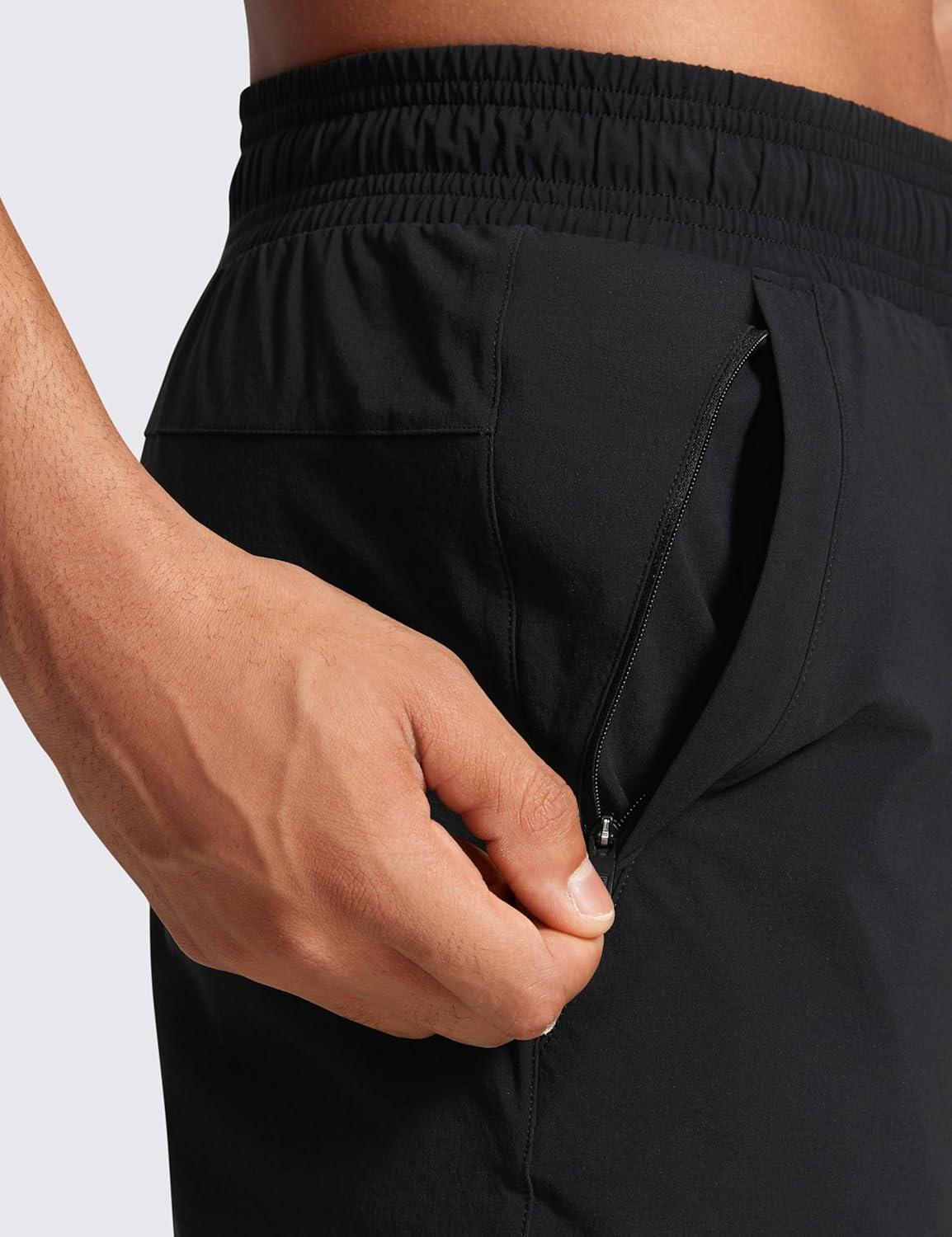 imageCRZ YOGA Stretch Workout Joggers for Men 29quot31quot Lightweight Water Resistant Outdoor Workout Pants with Zip PocketsBlack