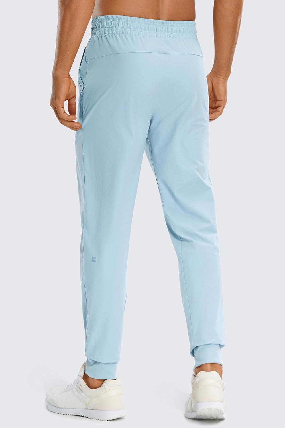 imageCRZ YOGA Stretch Workout Joggers for Men 29quot31quot Lightweight Water Resistant Outdoor Workout Pants with Zip PocketsChambray Blue