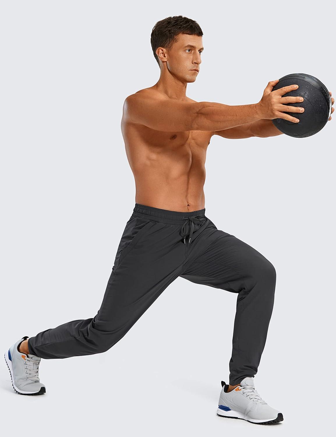 imageCRZ YOGA Stretch Workout Joggers for Men 29quot31quot Lightweight Water Resistant Outdoor Workout Pants with Zip PocketsInk Gray