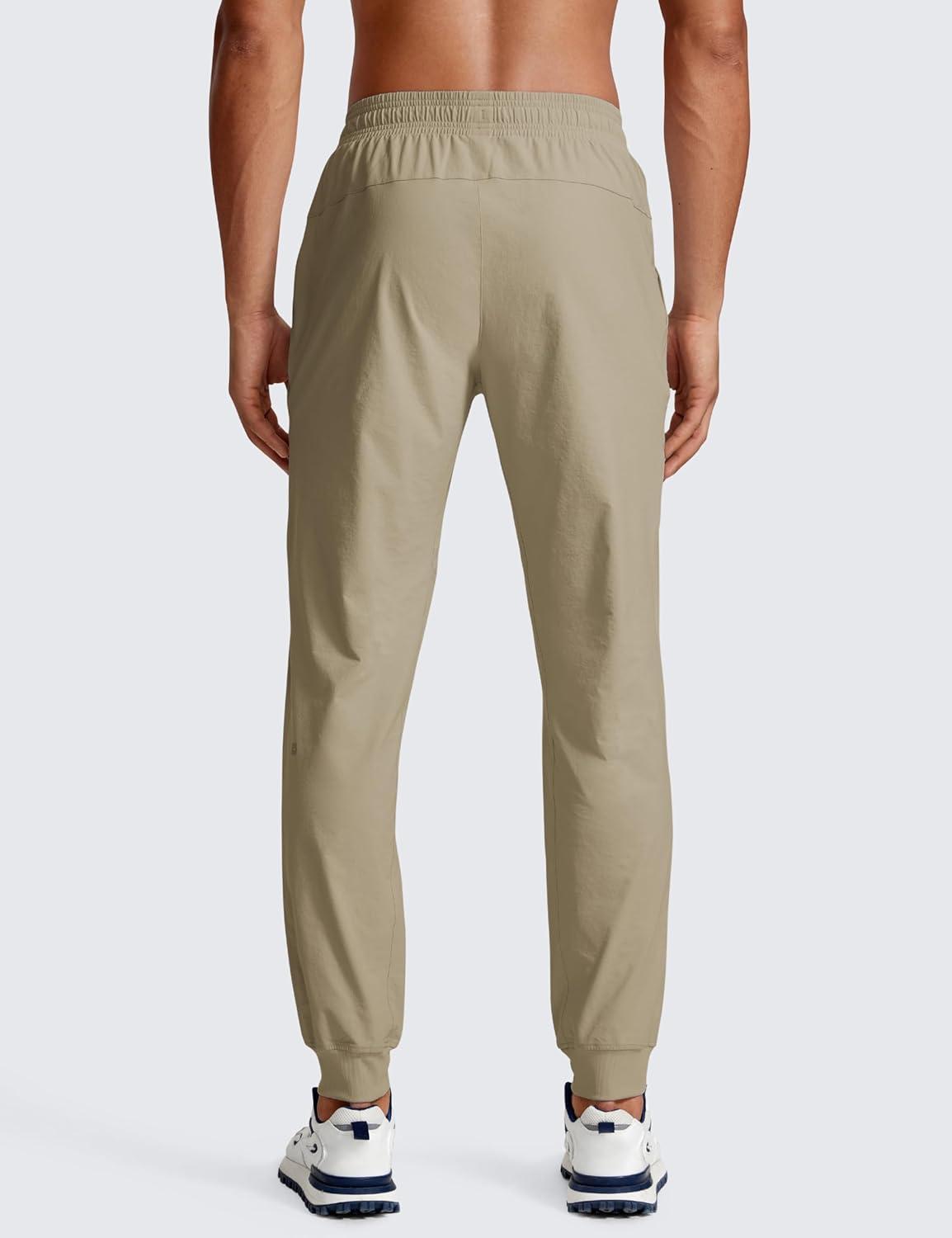 imageCRZ YOGA Stretch Workout Joggers for Men 29quot31quot Lightweight Water Resistant Outdoor Workout Pants with Zip PocketsKhali Barley