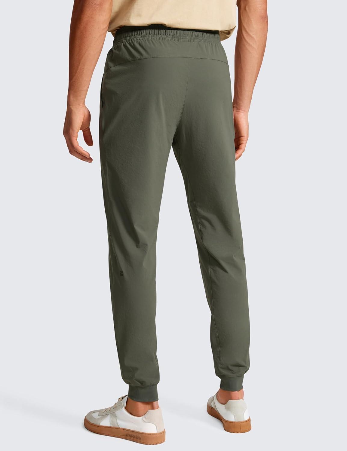 imageCRZ YOGA Stretch Workout Joggers for Men 29quot31quot Lightweight Water Resistant Outdoor Workout Pants with Zip PocketsLight Army Green