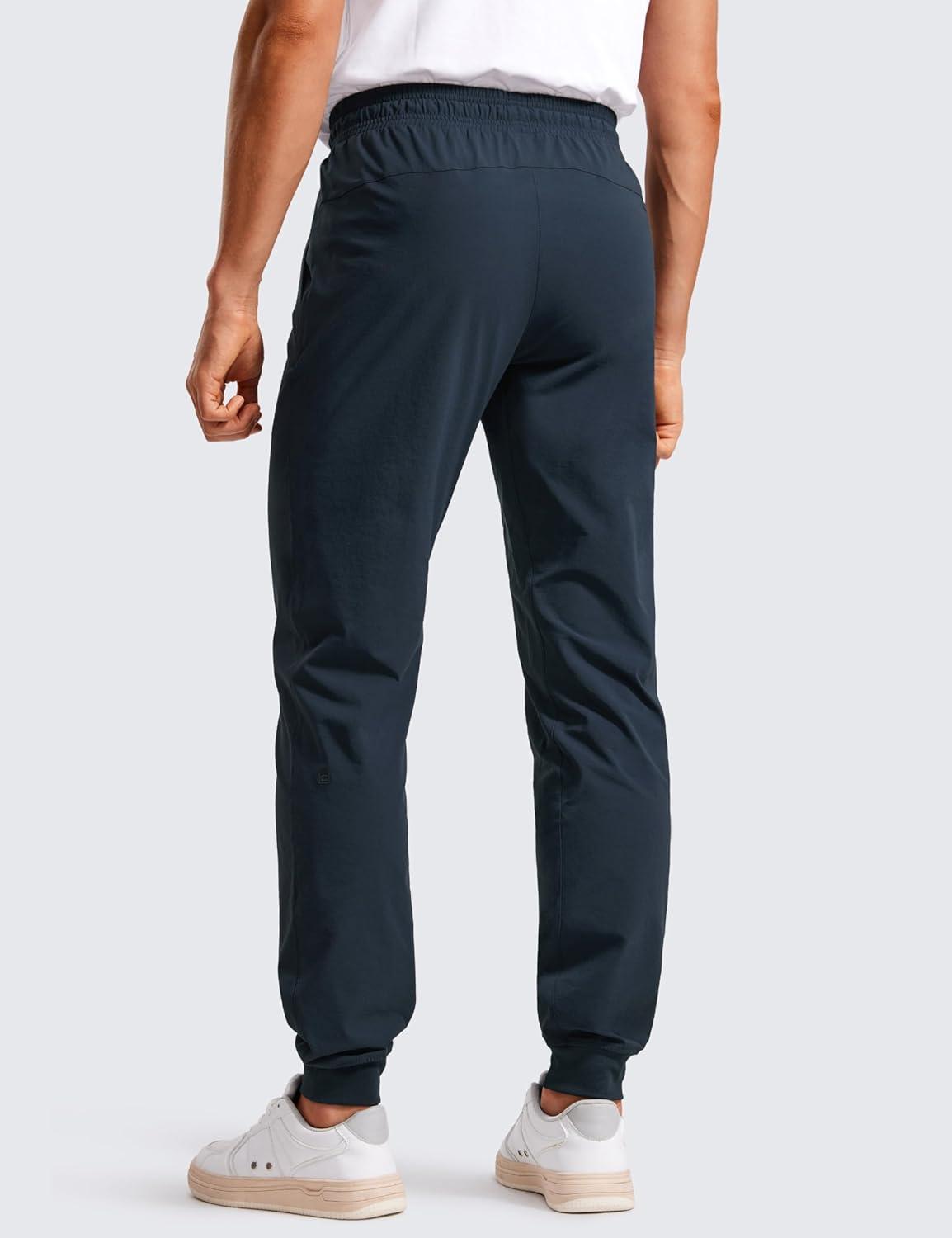 imageCRZ YOGA Stretch Workout Joggers for Men 29quot31quot Lightweight Water Resistant Outdoor Workout Pants with Zip PocketsTrue Navy