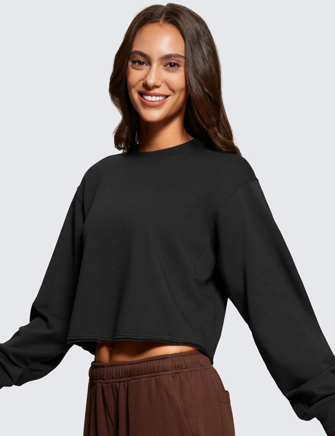 imageCRZ YOGA Womens Fleece Cropped Sweatshirts Crewneck Long Sleeve Double Raw Hem Workout Casual Pullover TopsBlack
