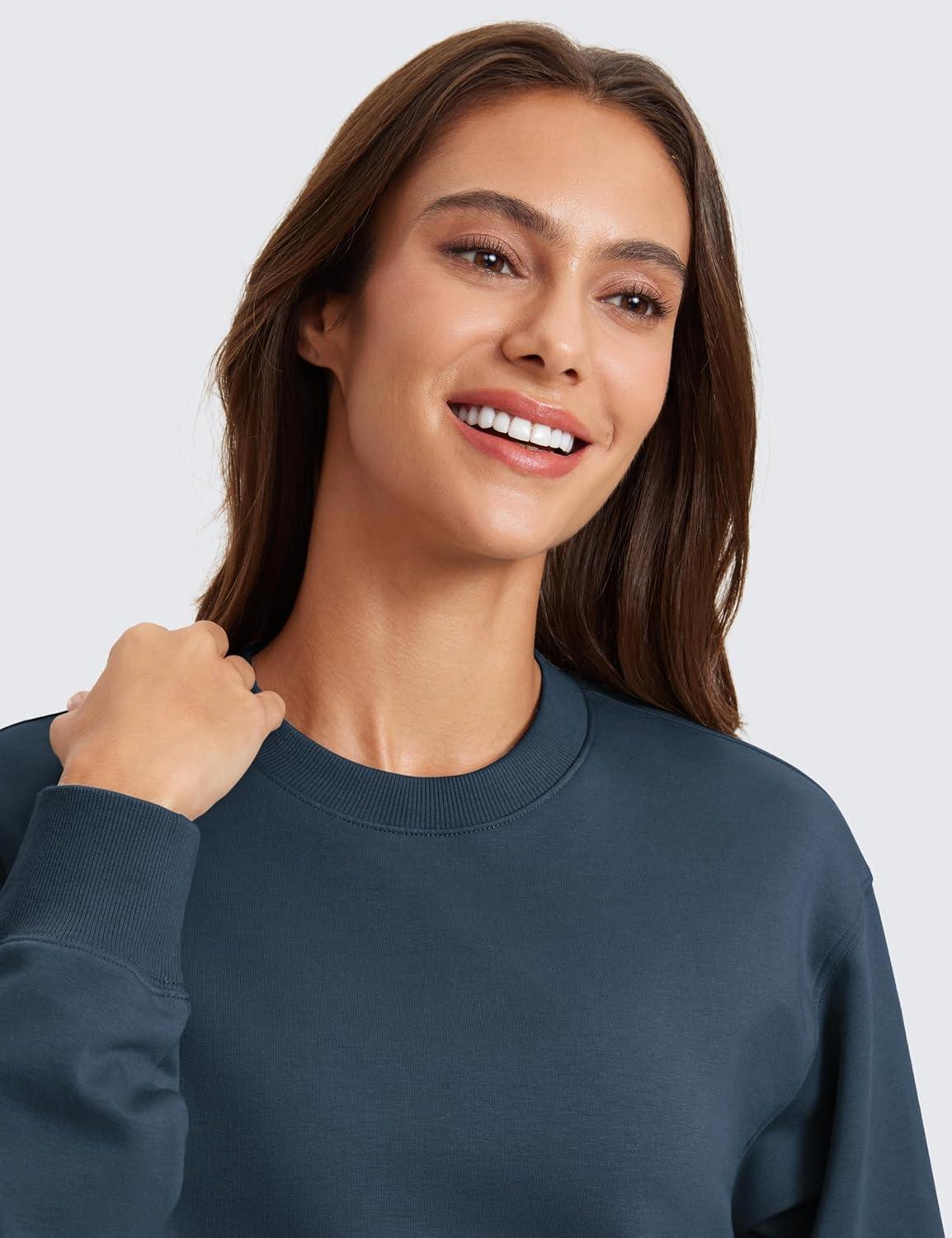 imageCRZ YOGA Womens Fleece Cropped Sweatshirts Crewneck Long Sleeve Double Raw Hem Workout Casual Pullover TopsInk Blue