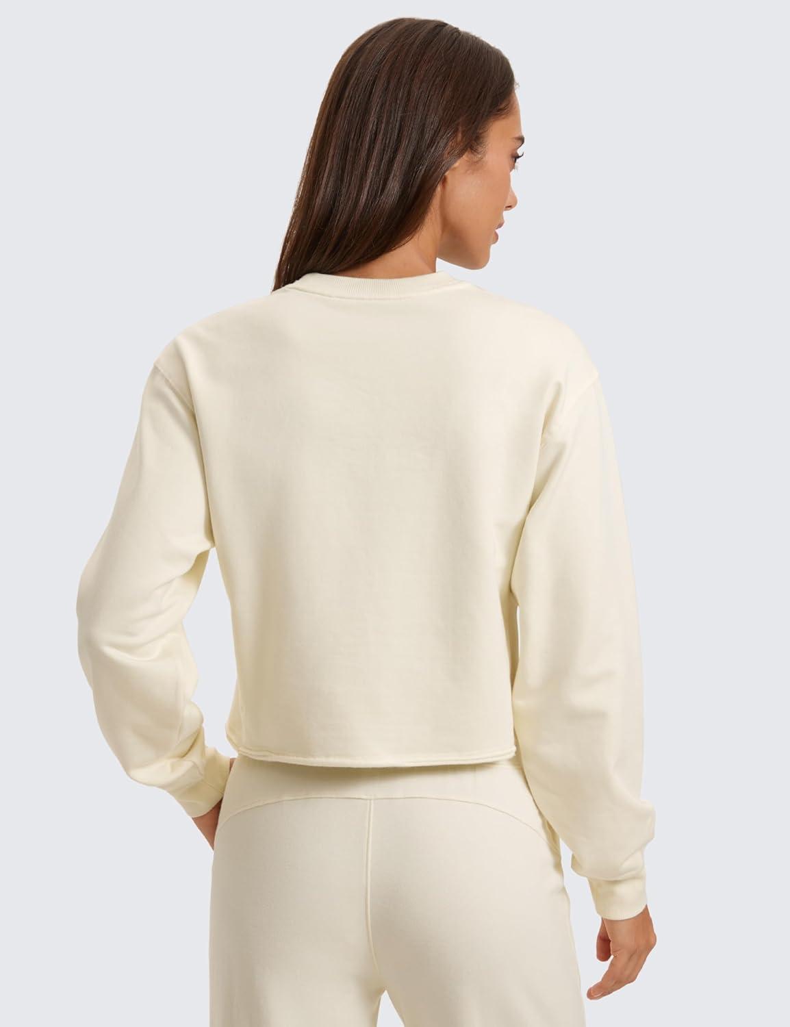 imageCRZ YOGA Womens Fleece Cropped Sweatshirts Crewneck Long Sleeve Double Raw Hem Workout Casual Pullover TopsWhite Apricot