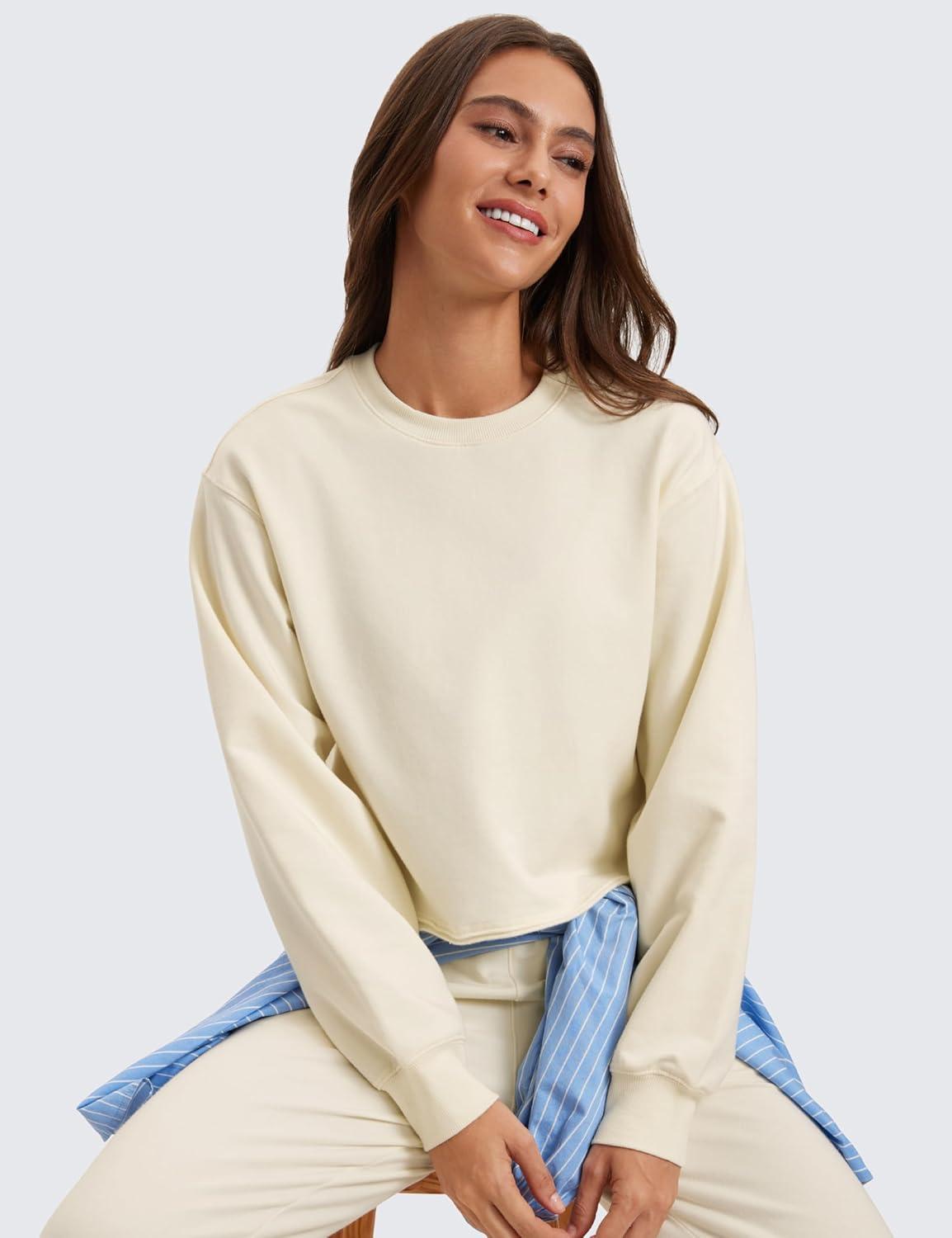 imageCRZ YOGA Womens Fleece Cropped Sweatshirts Crewneck Long Sleeve Double Raw Hem Workout Casual Pullover TopsWhite Apricot