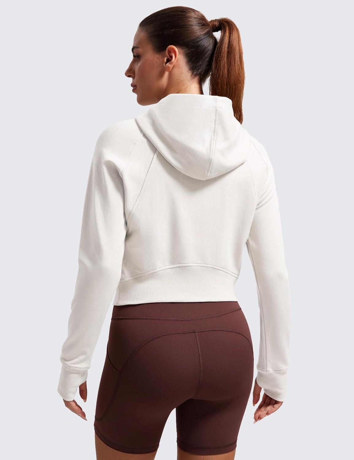 imageCRZ YOGA Womens Fleece Zip Up Cropped Hoodie Workout Jacket Athletic Casual Long Sleeve Sweatshirts with Thumb HolesMilky White Bone