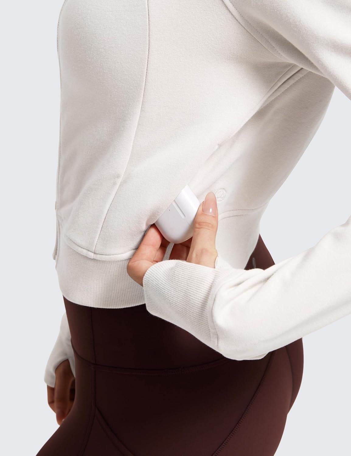 imageCRZ YOGA Womens Fleece Zip Up Cropped Hoodie Workout Jacket Athletic Casual Long Sleeve Sweatshirts with Thumb HolesMilky White Bone