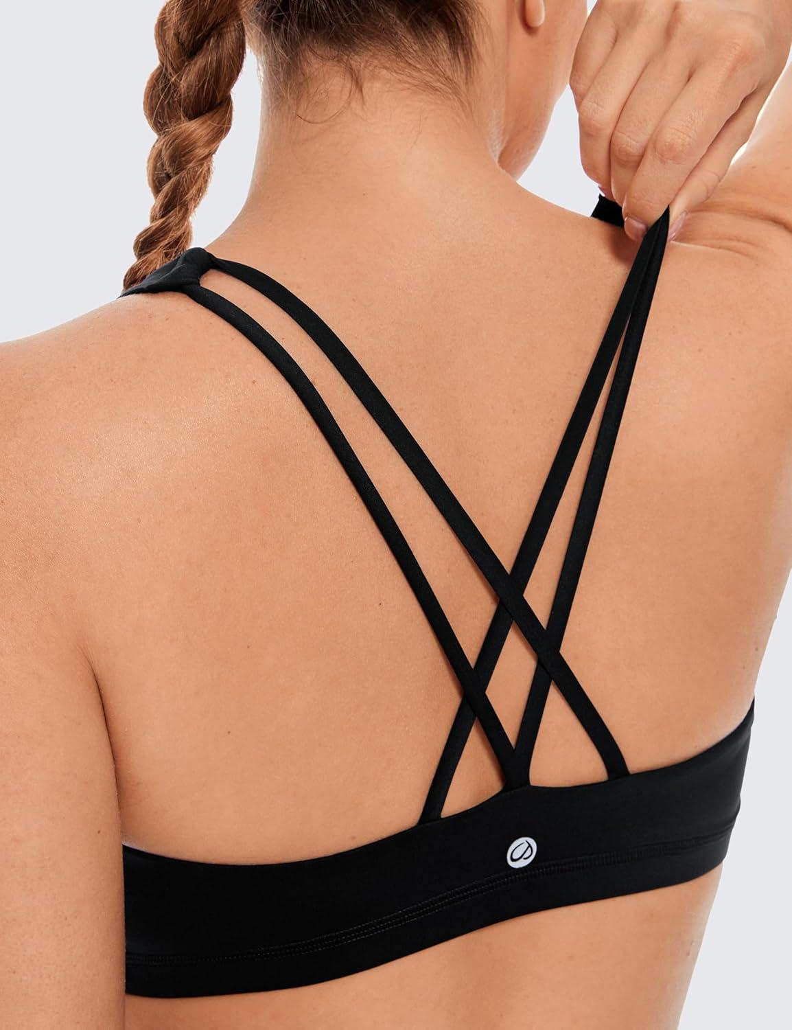 imageCRZ YOGA Womens Light Support Strappy Sports Bra Low Cut Wirefree Padded Yoga Cami Criss Cross BackBlack