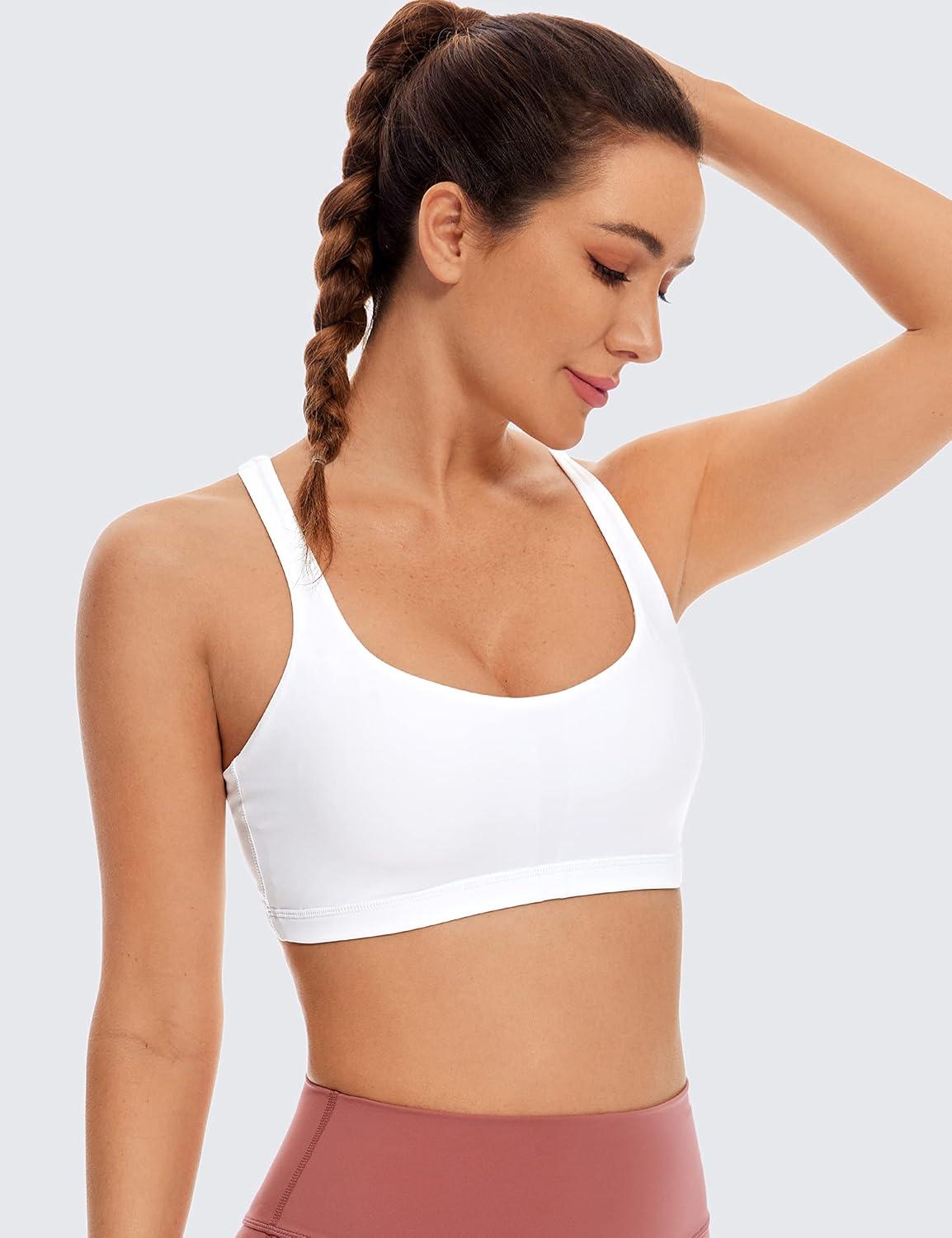 imageCRZ YOGA Womens Light Support Strappy Sports Bra Low Cut Wirefree Padded Yoga Cami Criss Cross BackWhite