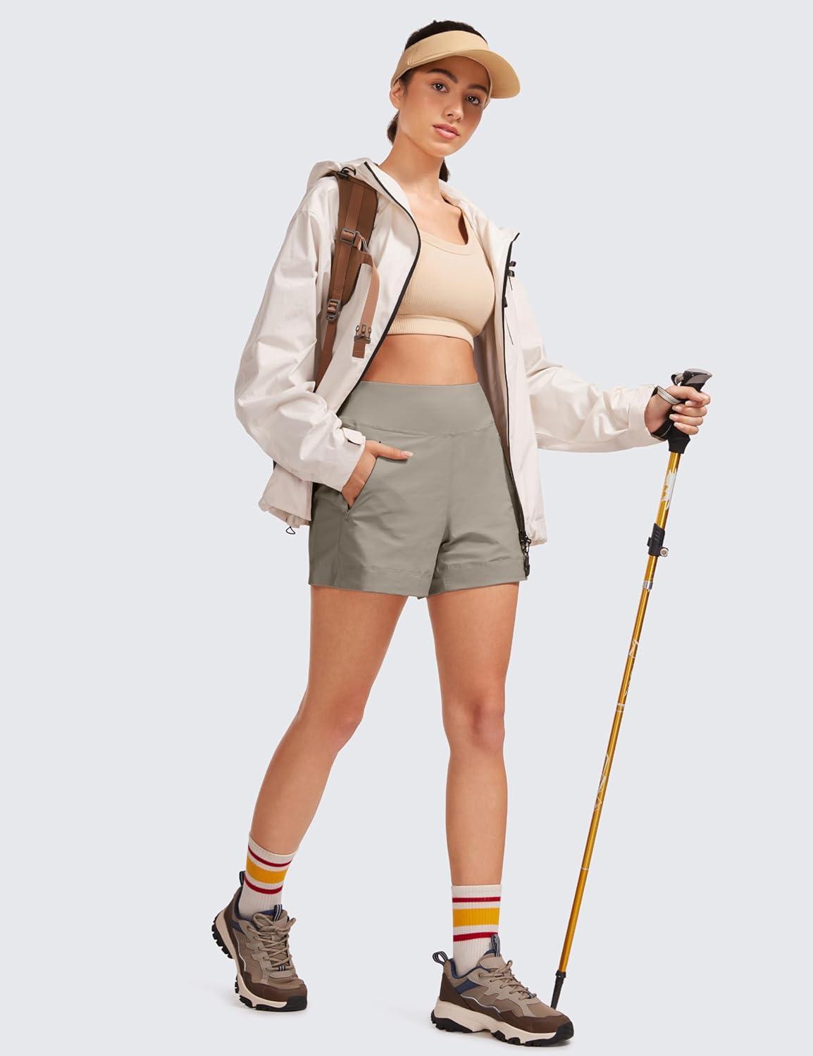 imageCRZ YOGA Womens Lightweight Mid Rise Hiking Shorts 4 Stretch for Athletic Summer Travel Outdoor Golf with Zip PocketsCliff Ash