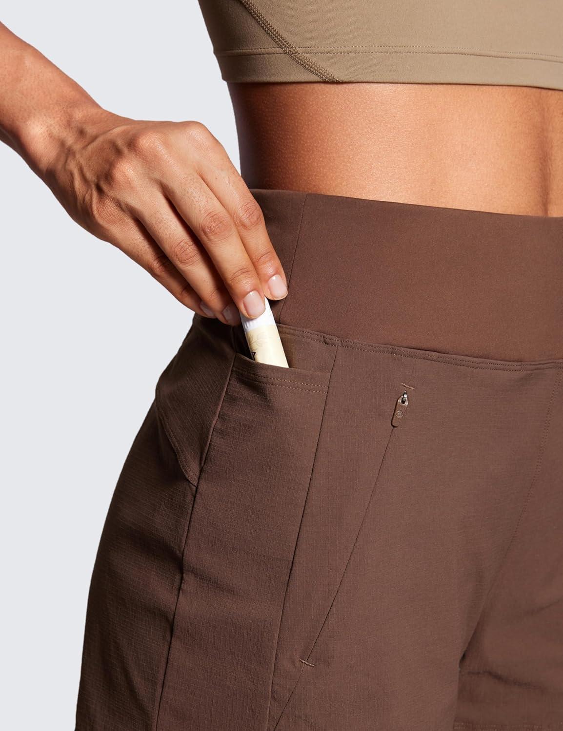 imageCRZ YOGA Womens Lightweight Mid Rise Hiking Shorts 4 Stretch for Athletic Summer Travel Outdoor Golf with Zip PocketsCoffee Brown