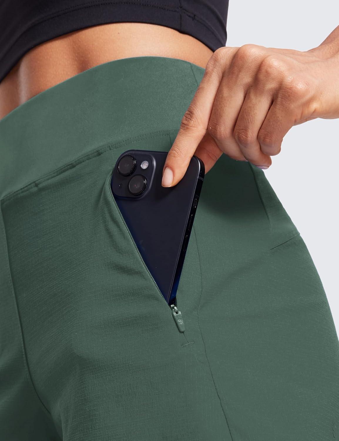 imageCRZ YOGA Womens Lightweight Mid Rise Hiking Shorts 4 Stretch for Athletic Summer Travel Outdoor Golf with Zip PocketsDark Forest Green