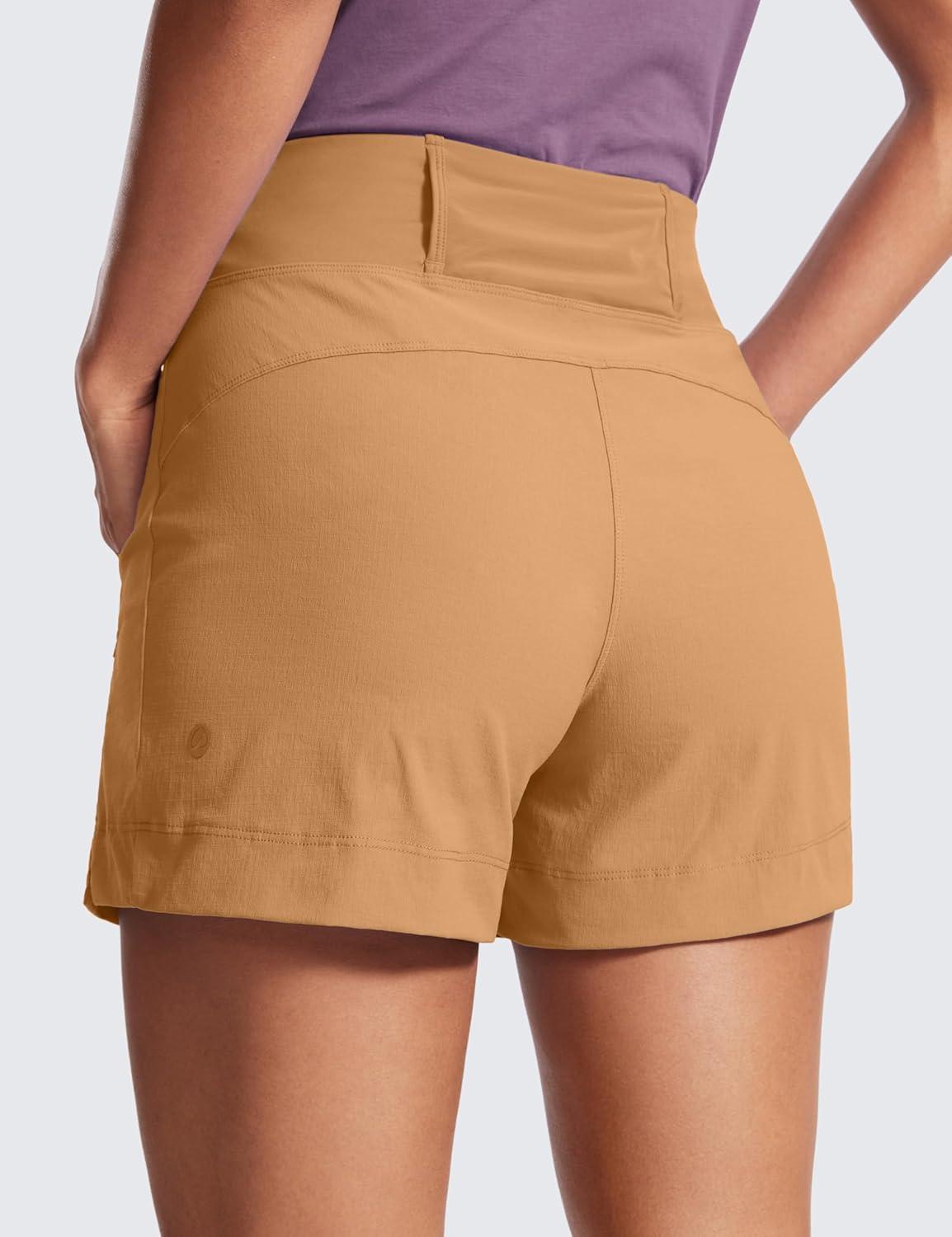 imageCRZ YOGA Womens Lightweight Mid Rise Hiking Shorts 4 Stretch for Athletic Summer Travel Outdoor Golf with Zip PocketsDoe Brown