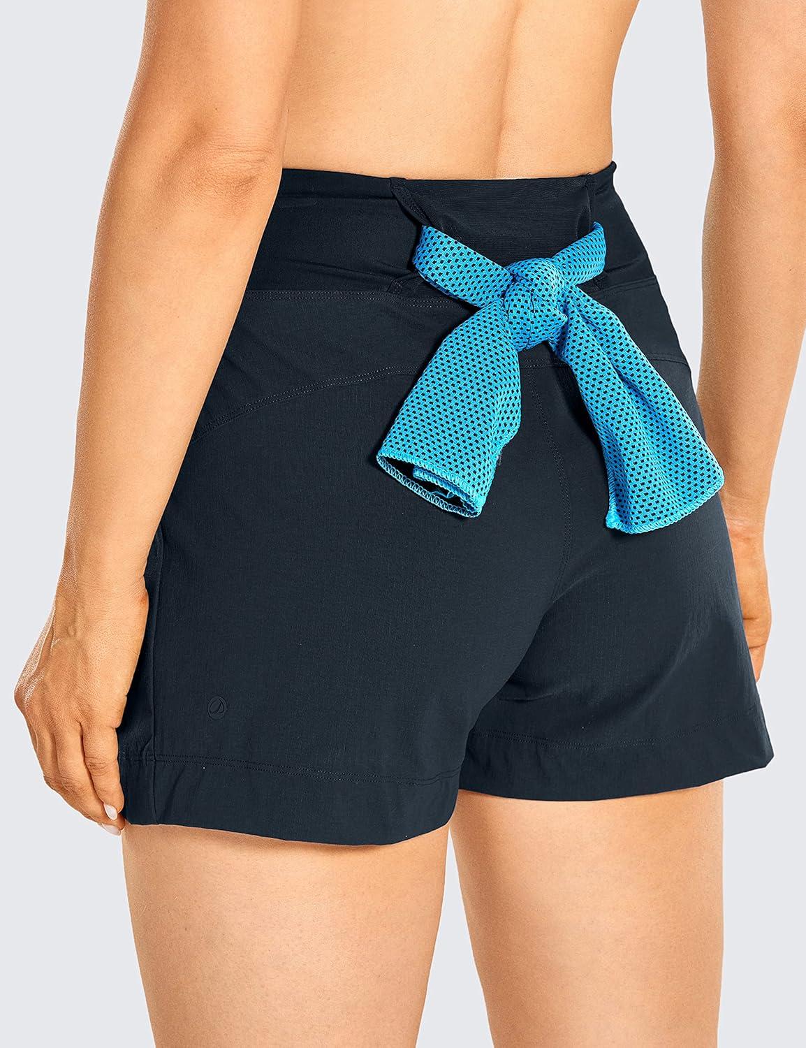 imageCRZ YOGA Womens Lightweight Mid Rise Hiking Shorts 4 Stretch for Athletic Summer Travel Outdoor Golf with Zip PocketsTrue Navy