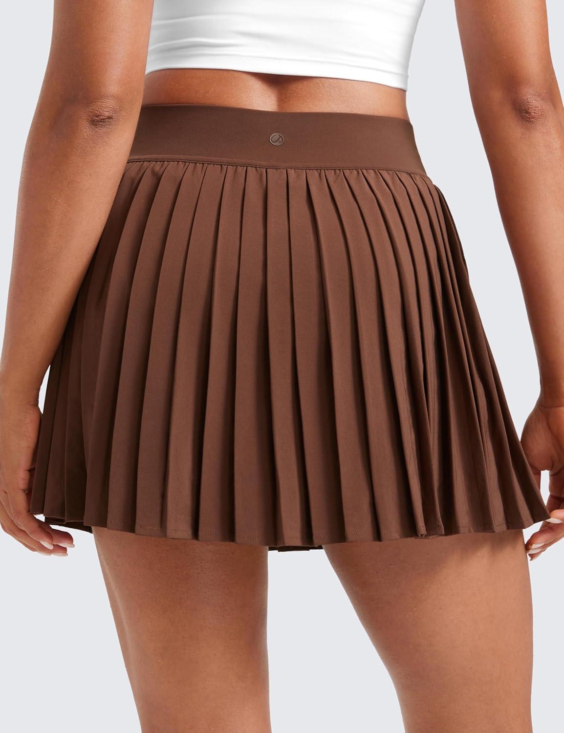 imageCRZ YOGA Womens Mini Pleated Athletic Tennis Skirts High Waisted A Line Golf Pickleball Casual Skort with Inner PocketsCoffee Brown