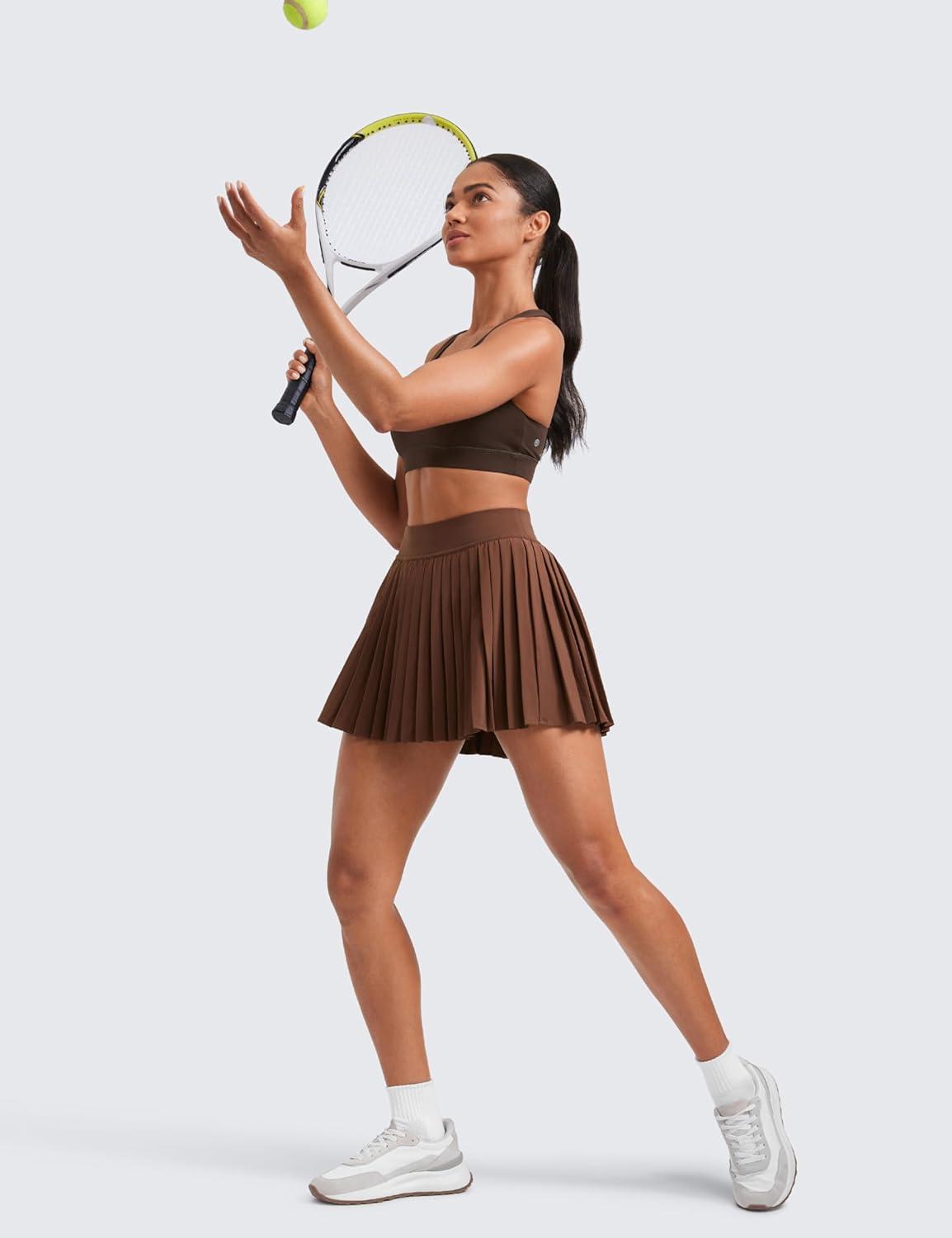 imageCRZ YOGA Womens Mini Pleated Athletic Tennis Skirts High Waisted A Line Golf Pickleball Casual Skort with Inner PocketsCoffee Brown