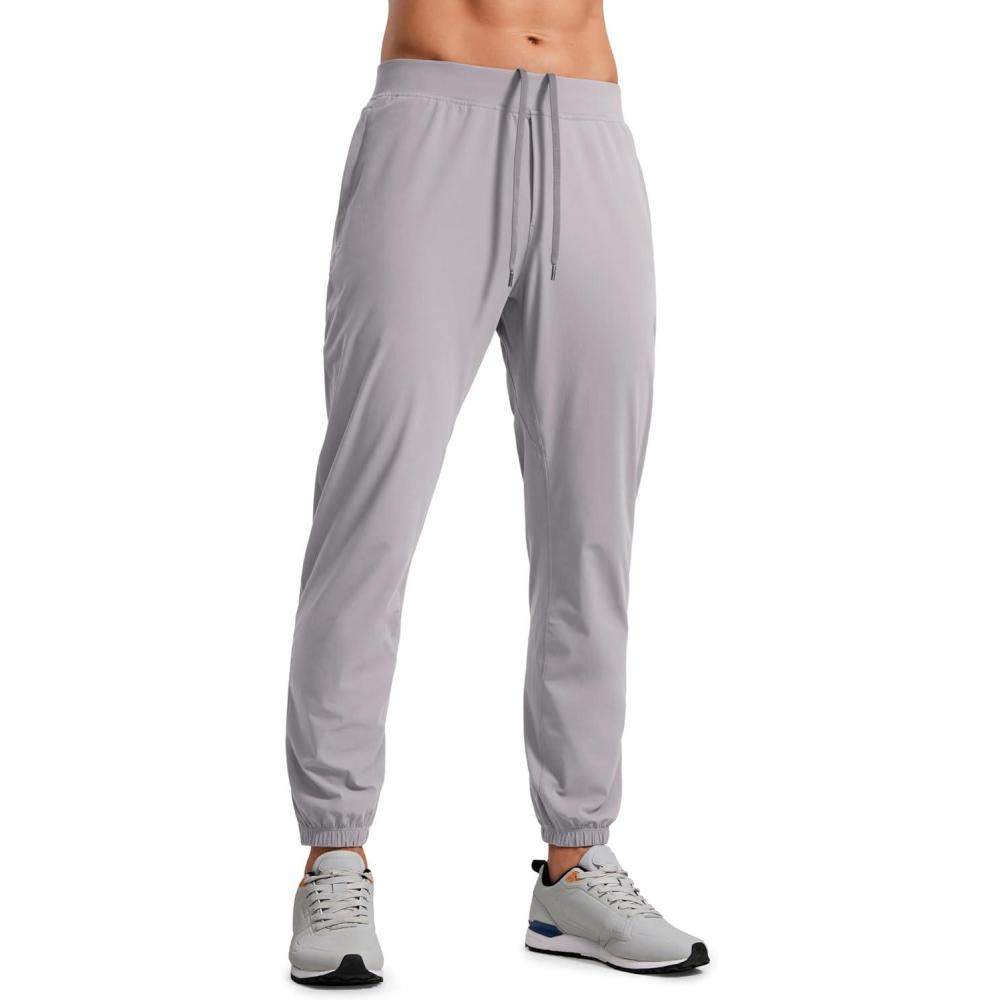 imageCRZ YOGA Athletic Joggers for Men 29quot Lightweight Running Training Pants with Zip Pockets and Ankle ZippersDark Chrome