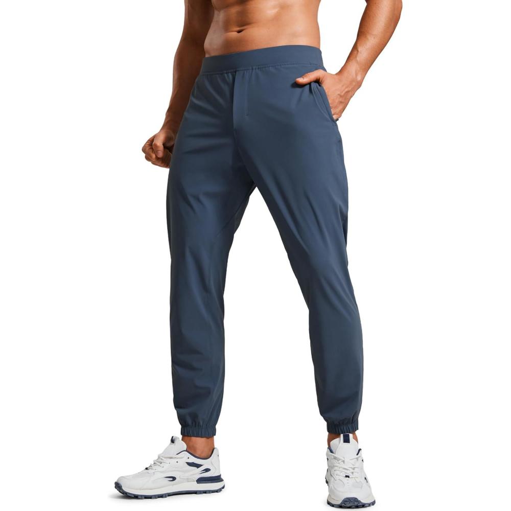 imageCRZ YOGA Athletic Joggers for Men 29quot Lightweight Running Training Pants with Zip Pockets and Ankle ZippersElectric Blue