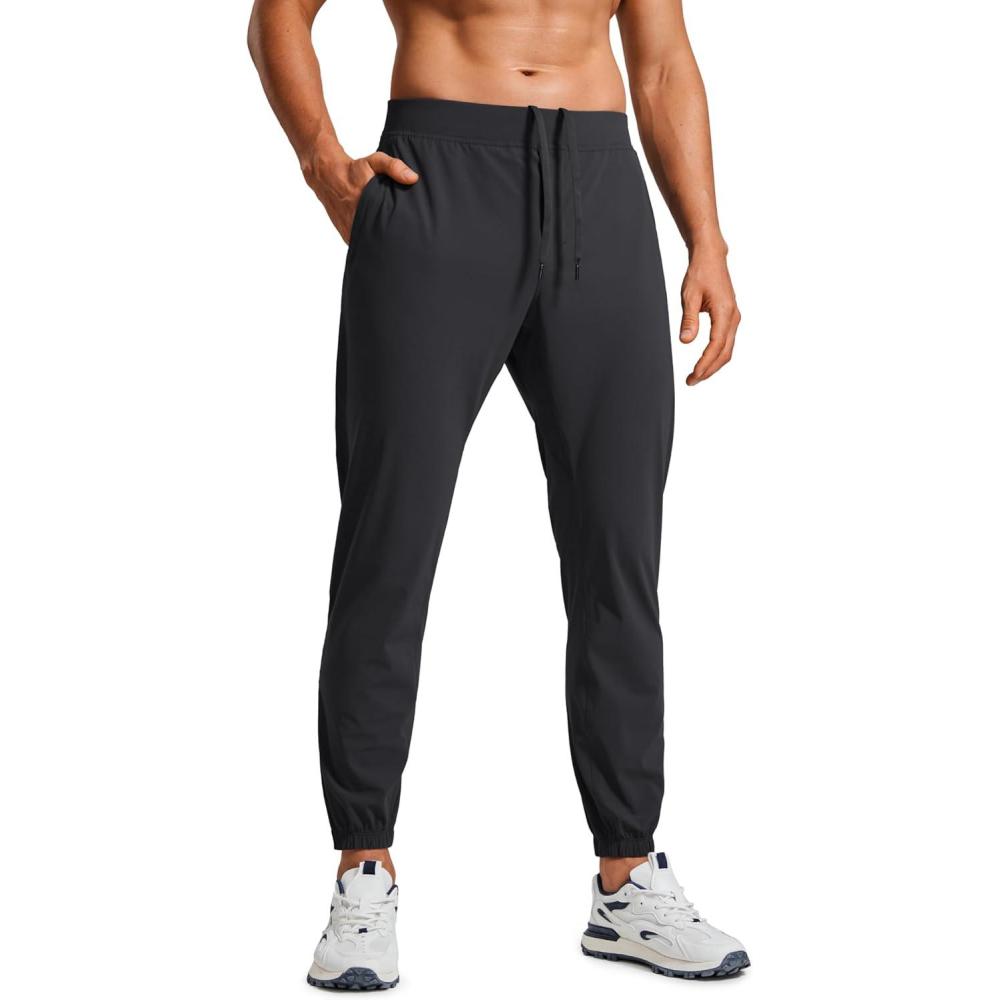 imageCRZ YOGA Athletic Joggers for Men 29quot Lightweight Running Training Pants with Zip Pockets and Ankle ZippersInk Gray