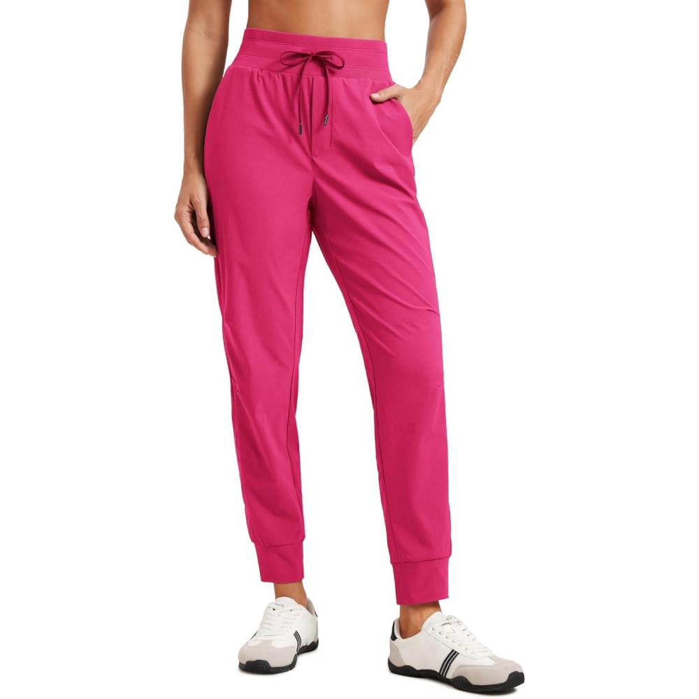 imageCRZ YOGA Athletic Joggers for Women 275quot Lightweight Travel Outdoor Hiking Pants with PocketsGranita Pink