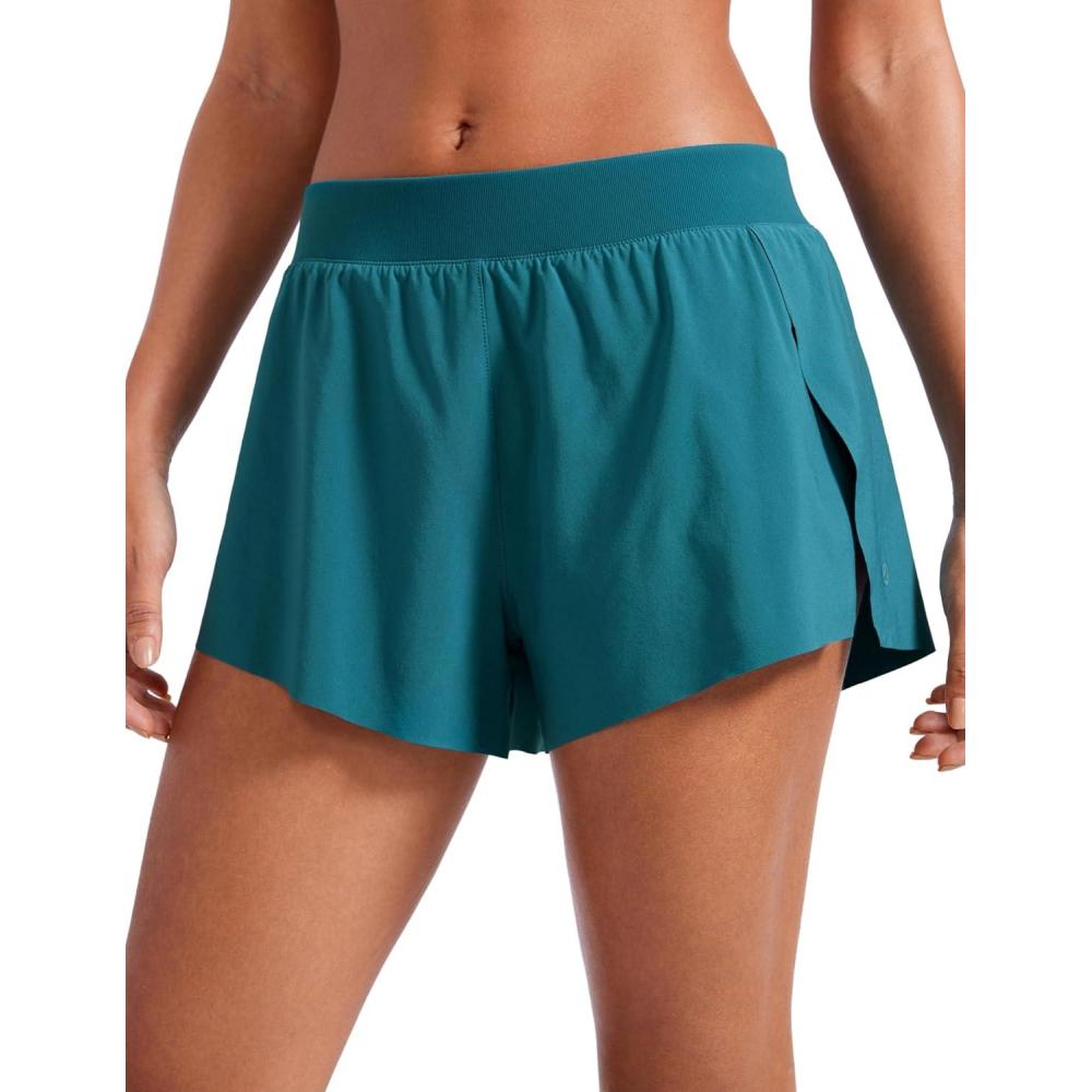 imageCRZ YOGA Athletic Running Shorts for Women V Split Low Waisted Lightweight Gym Workout Athletic Shorts with LinerBorealis Green
