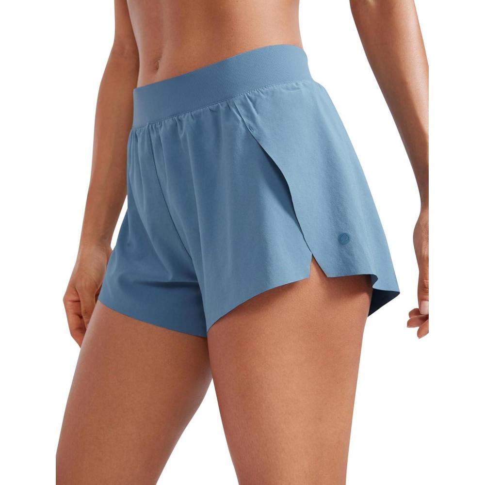 imageCRZ YOGA Athletic Running Shorts for Women V Split Low Waisted Lightweight Gym Workout Athletic Shorts with LinerUniverse Blue
