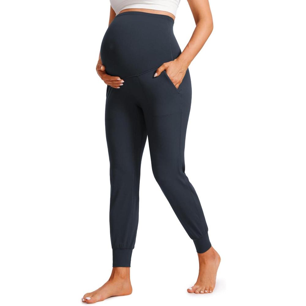 imageCRZ YOGA Butterluxe Maternity Joggers Pockets 27quot Workout Active Yoga Pregnancy Womens Pants Over The Belly SoftTrue Navy