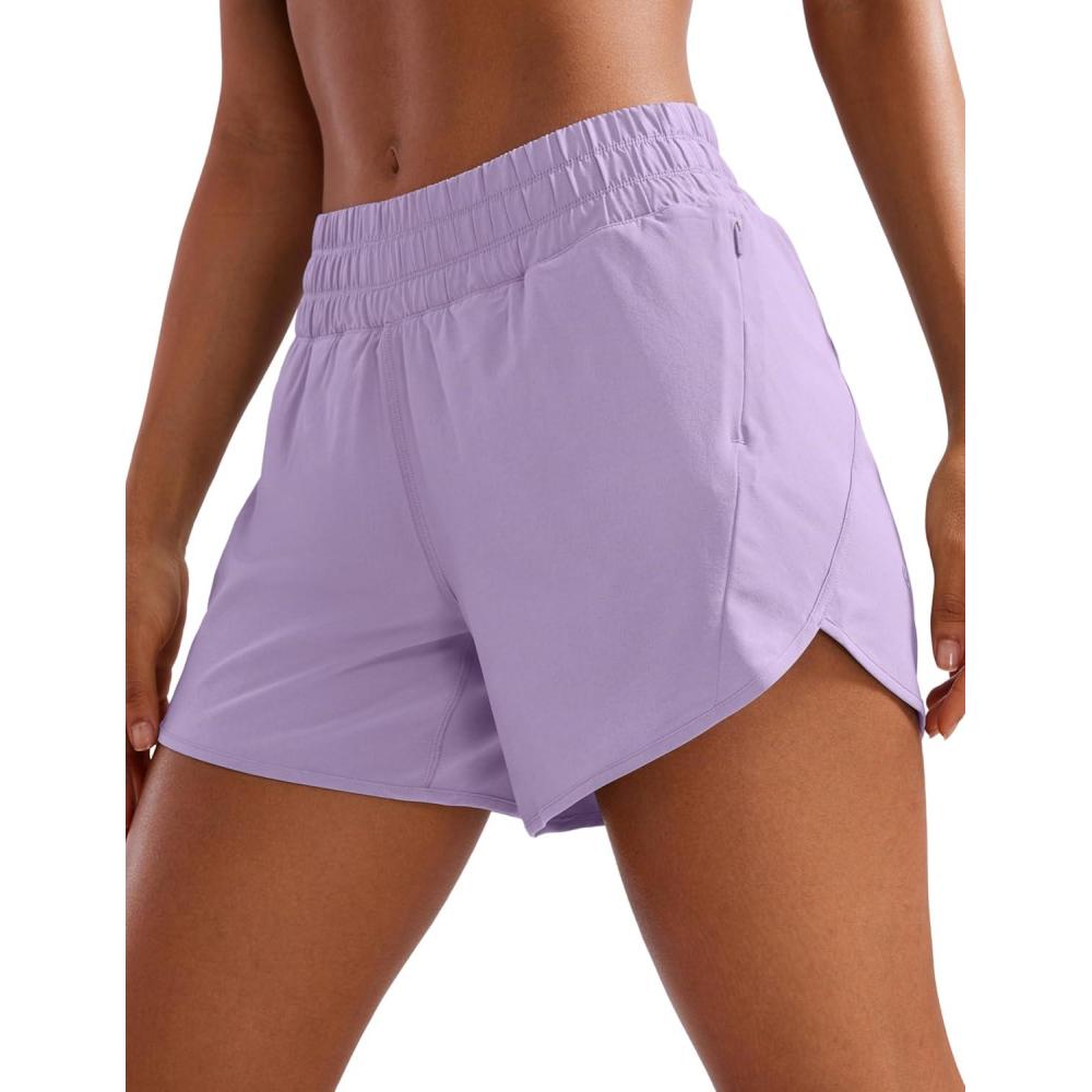 imageCRZ YOGA Dolphin Athletic Shorts for Women 5quot High Waisted Quick Dry for Running Workout Gym Track with Zip PocketLilac