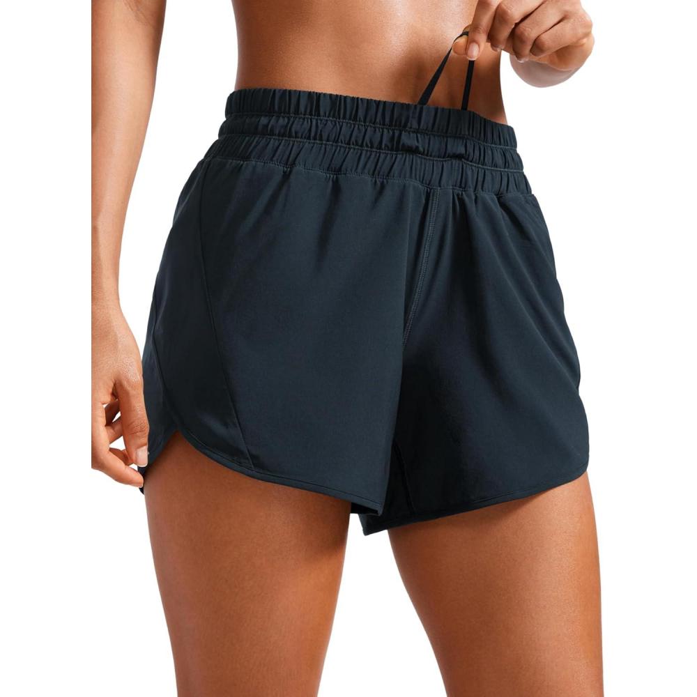 imageCRZ YOGA Dolphin Athletic Shorts for Women 5quot High Waisted Quick Dry for Running Workout Gym Track with Zip PocketTrue Navy