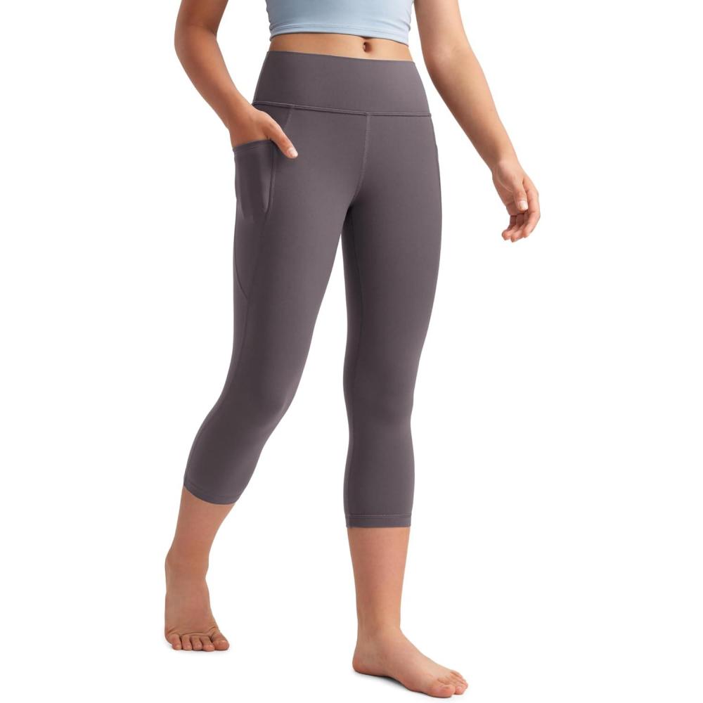 imageCRZ YOGA Girls Butterluxe Yoga Capri Leggings with Pockets Athletic Sports Casual Pants High Waist Tights Kids TeenTornado Grey